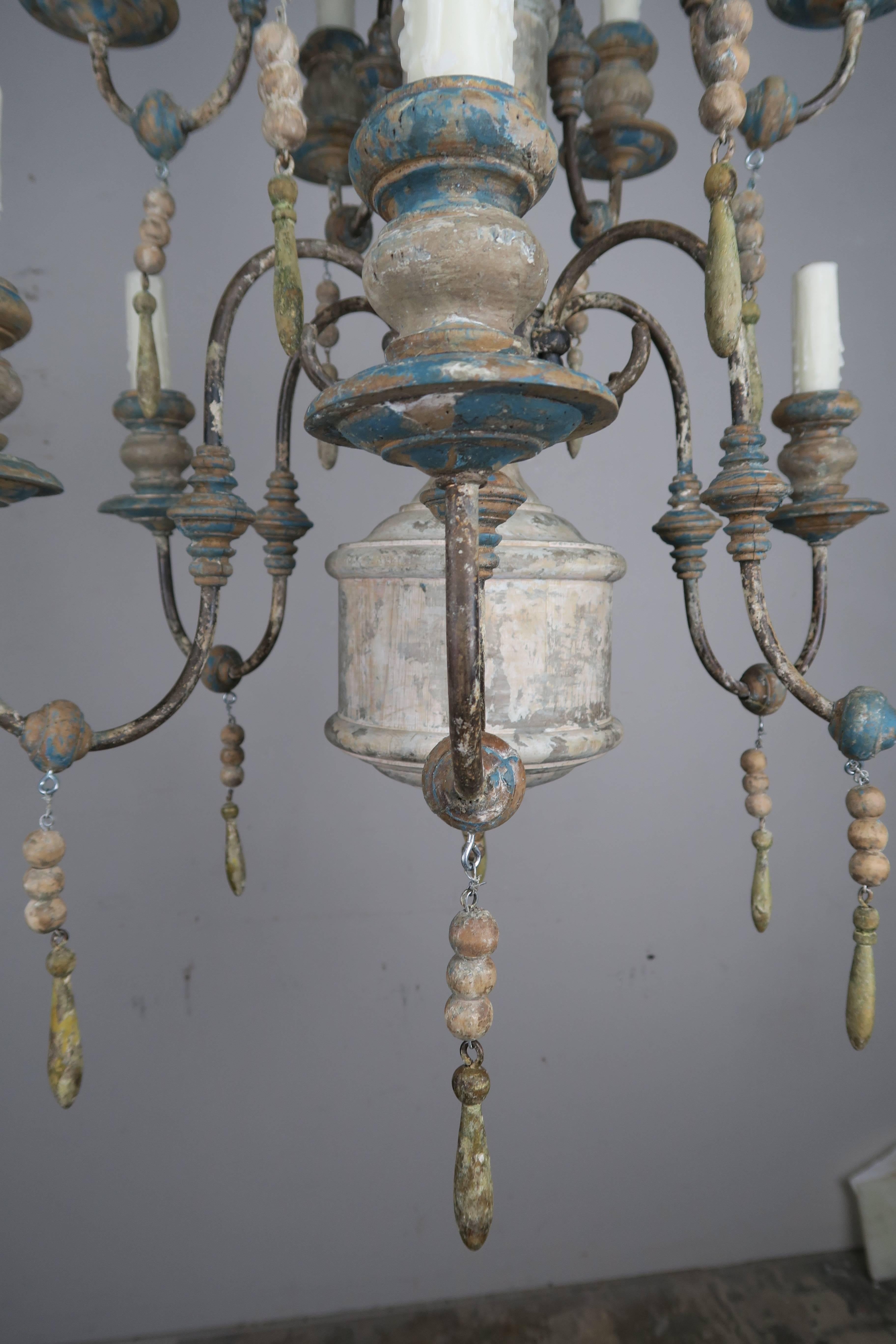 Italian Pair of Twelve-Light Wood and Iron Painted Chandeliers