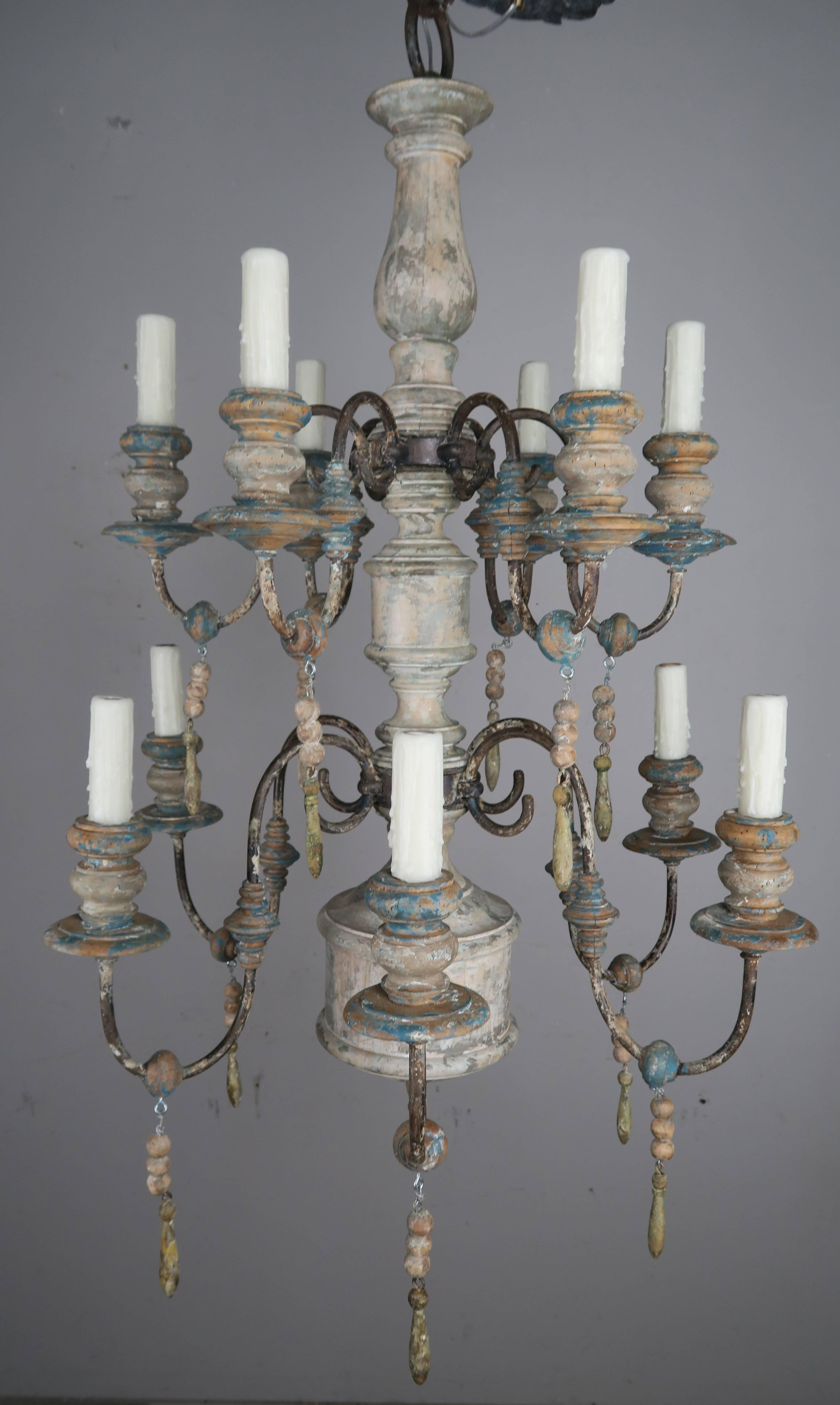 Rustic Pair of Twelve-Light Wood and Iron Painted Chandeliers