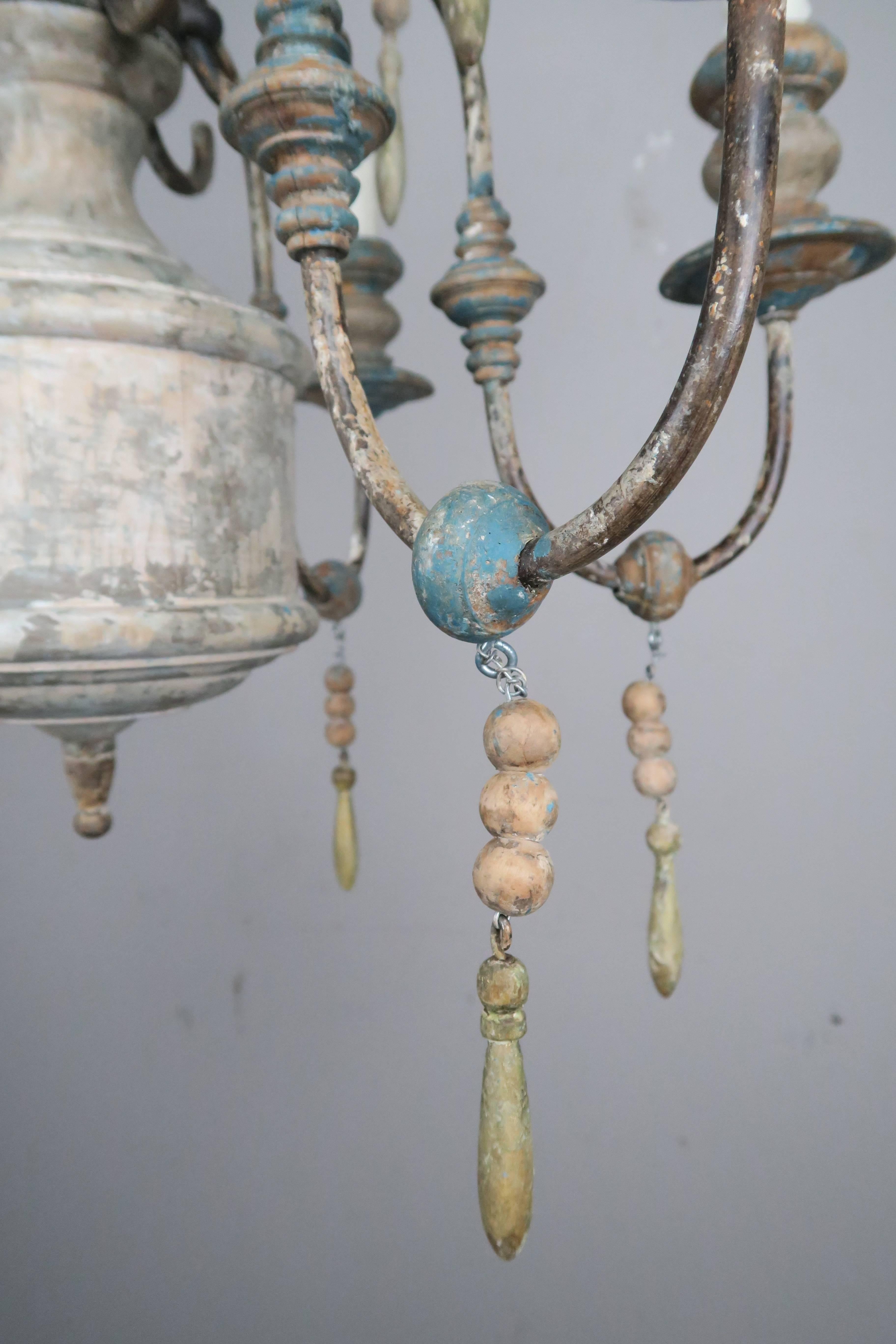 Pair of Twelve-Light Wood and Iron Painted Chandeliers 4