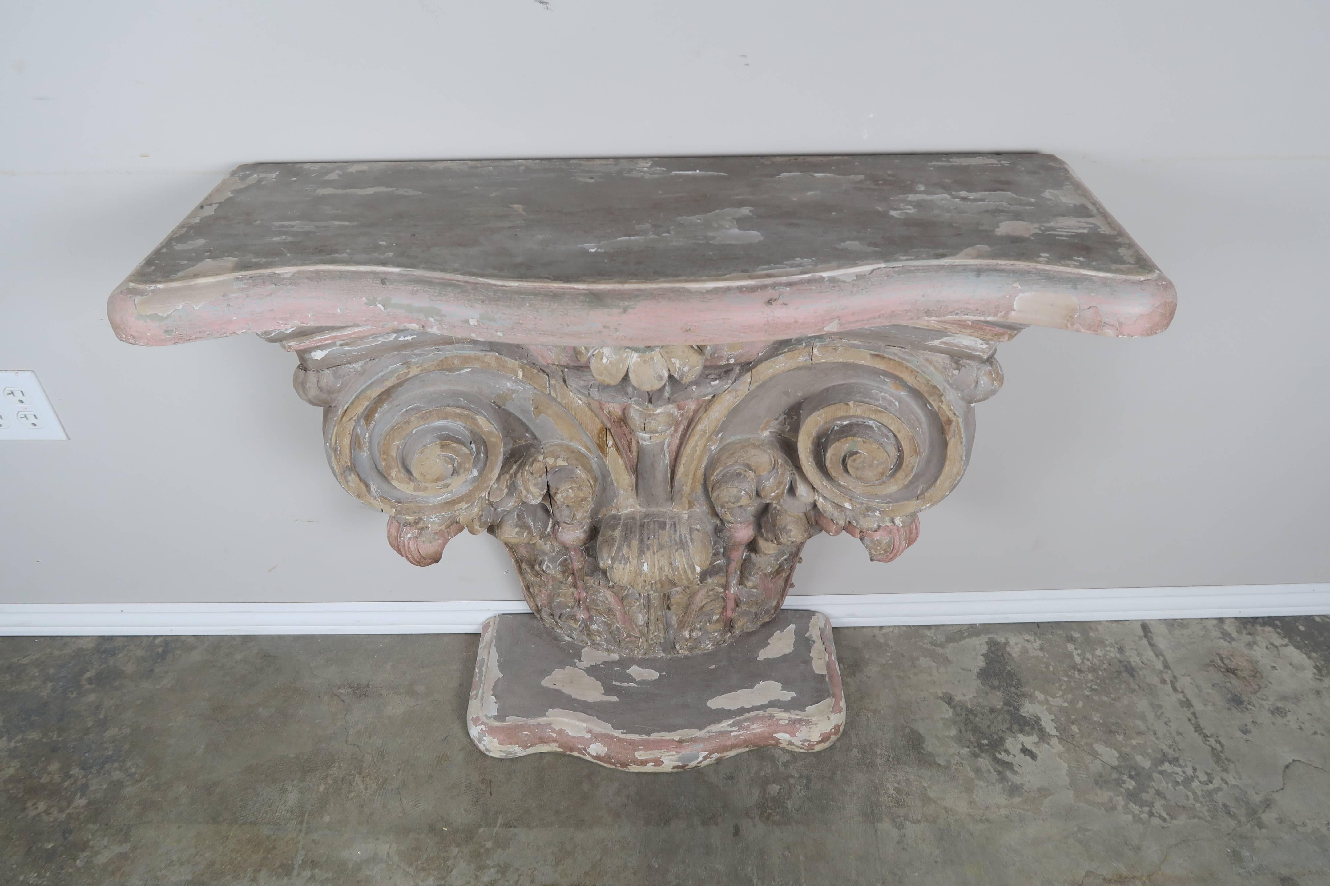 Italian carved wood painted capital with a scalloped top.