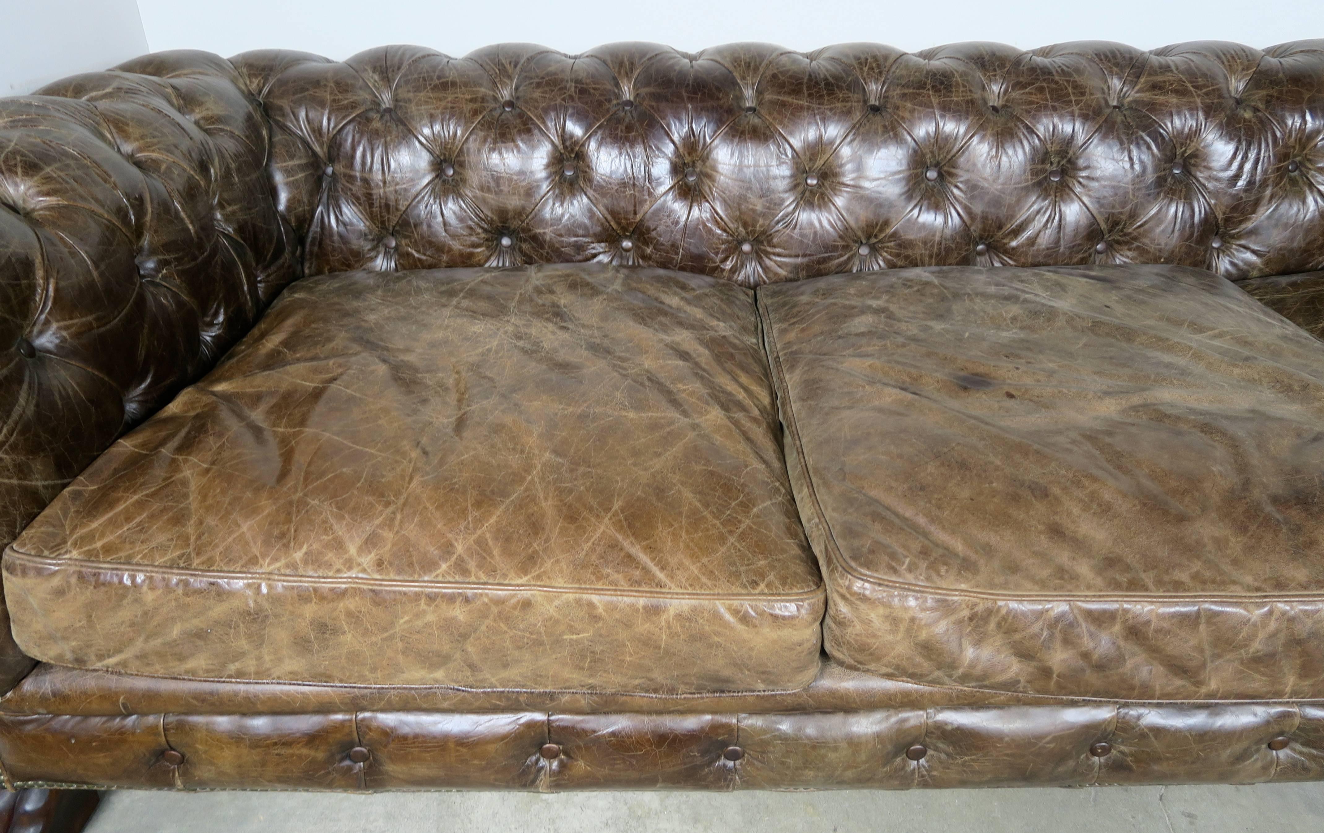 English Leather Tufted Chesterfield Style Sofa with Lion Paw Feet In Distressed Condition In Los Angeles, CA
