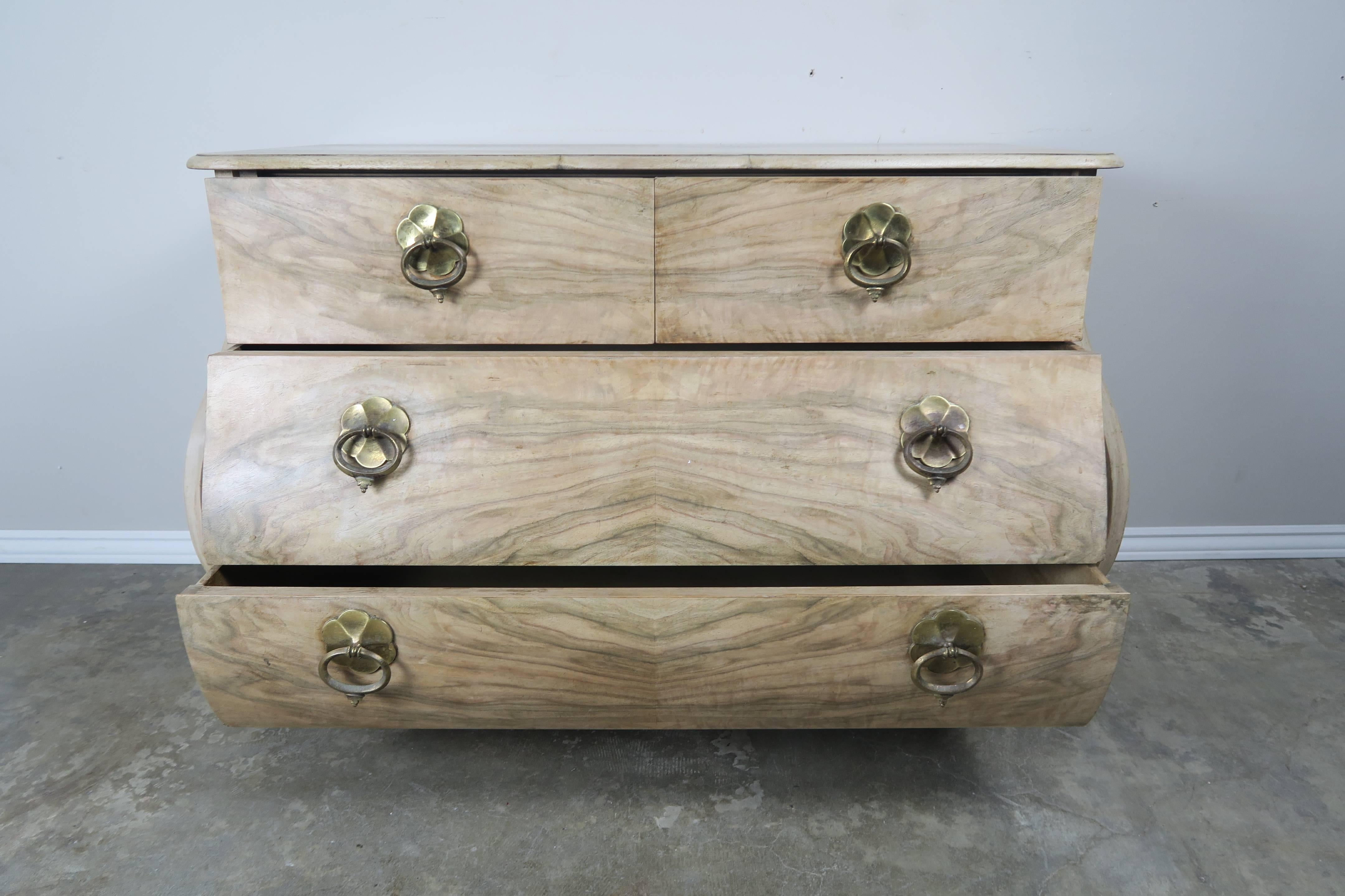 Italian natural wood finished four drawer commode with original Italian brass hardware marked 