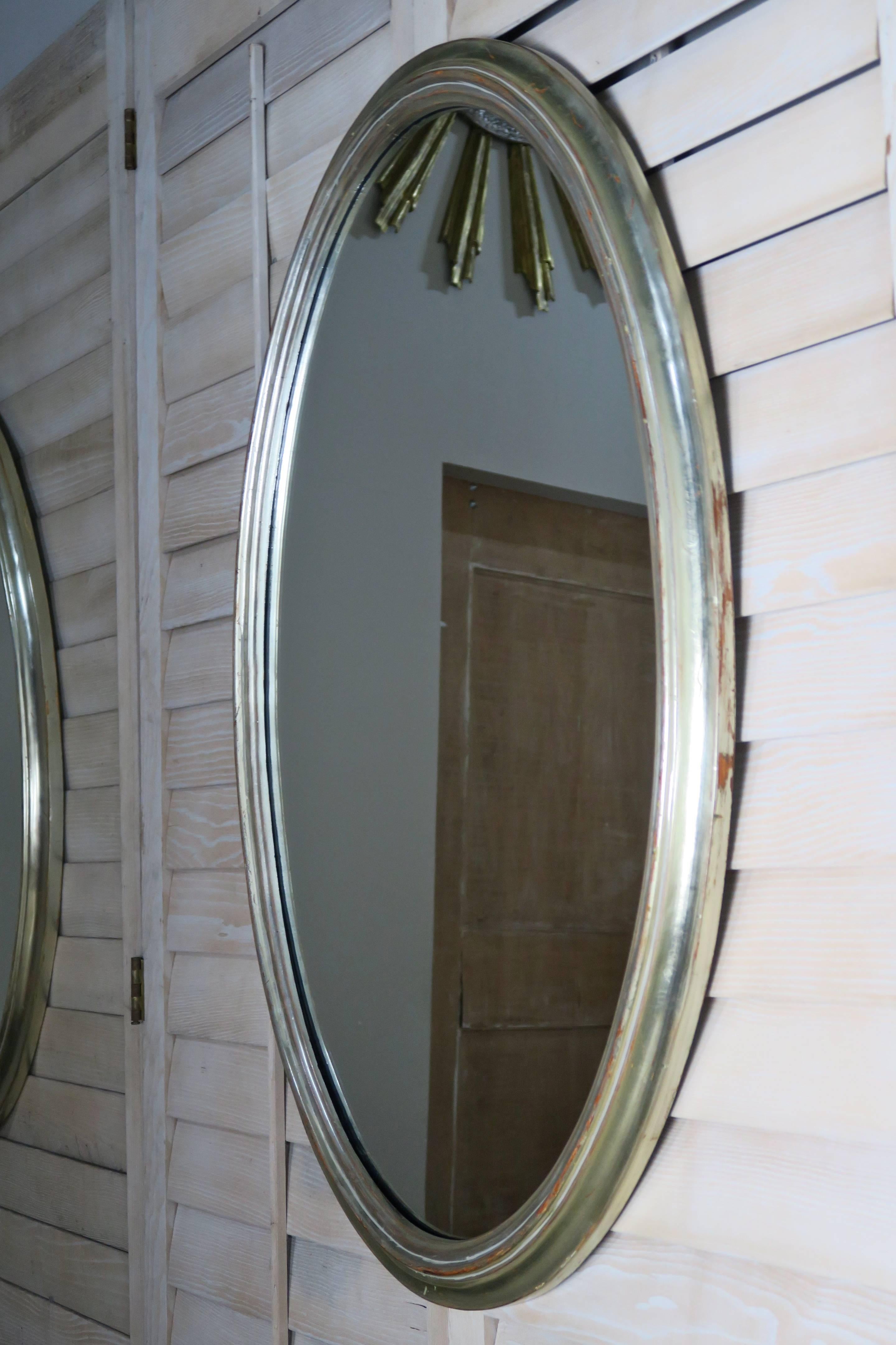 Wood Pair of Mid-Century Oval Silver Mirrors
