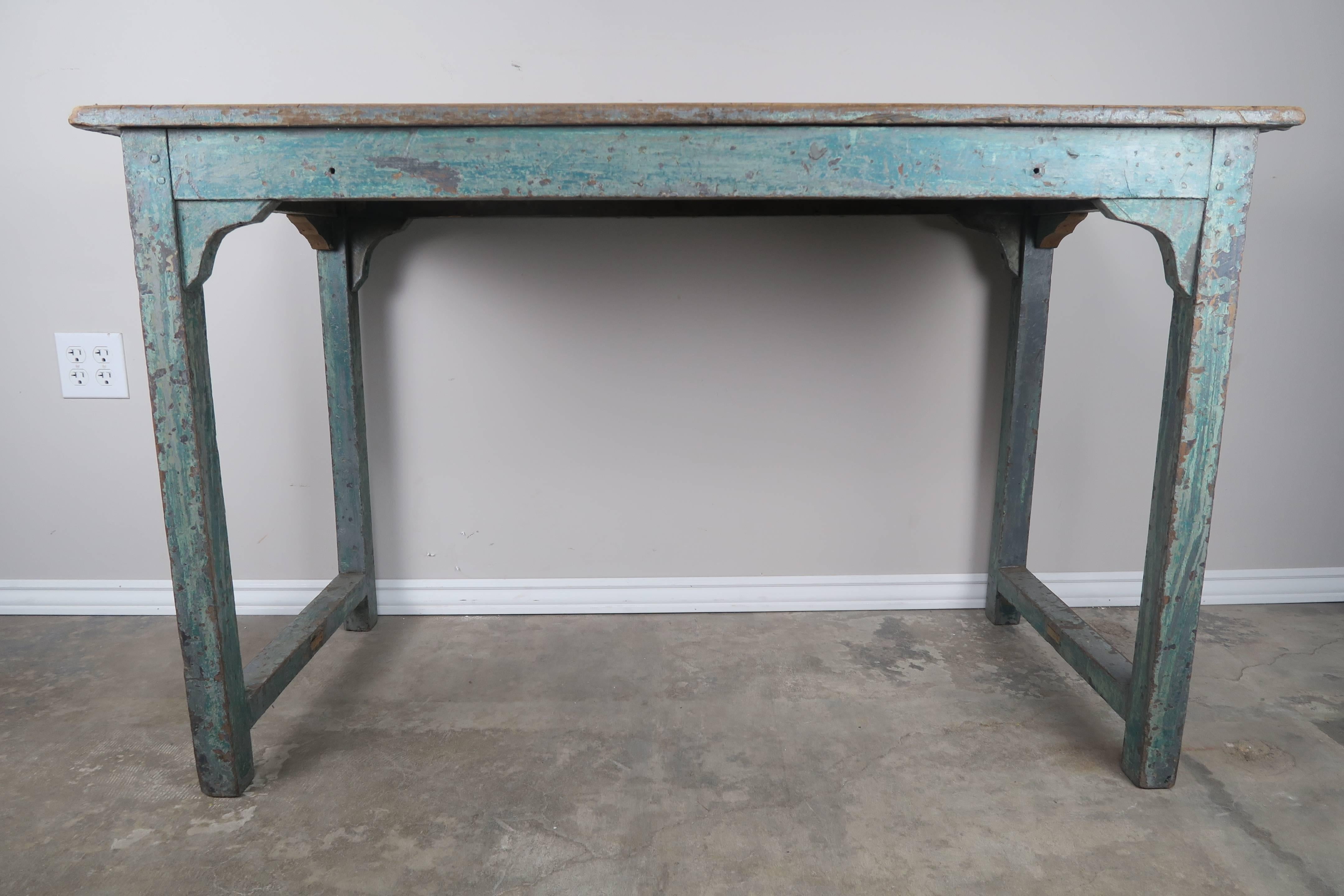 19th century Swedish Primitive style table with a blue painted base and a natural wood top.