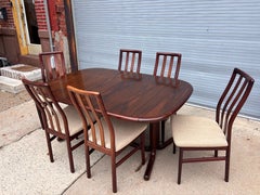Mid-20th Century Rosewood Dining Table with 6 Chairs by Boltinge