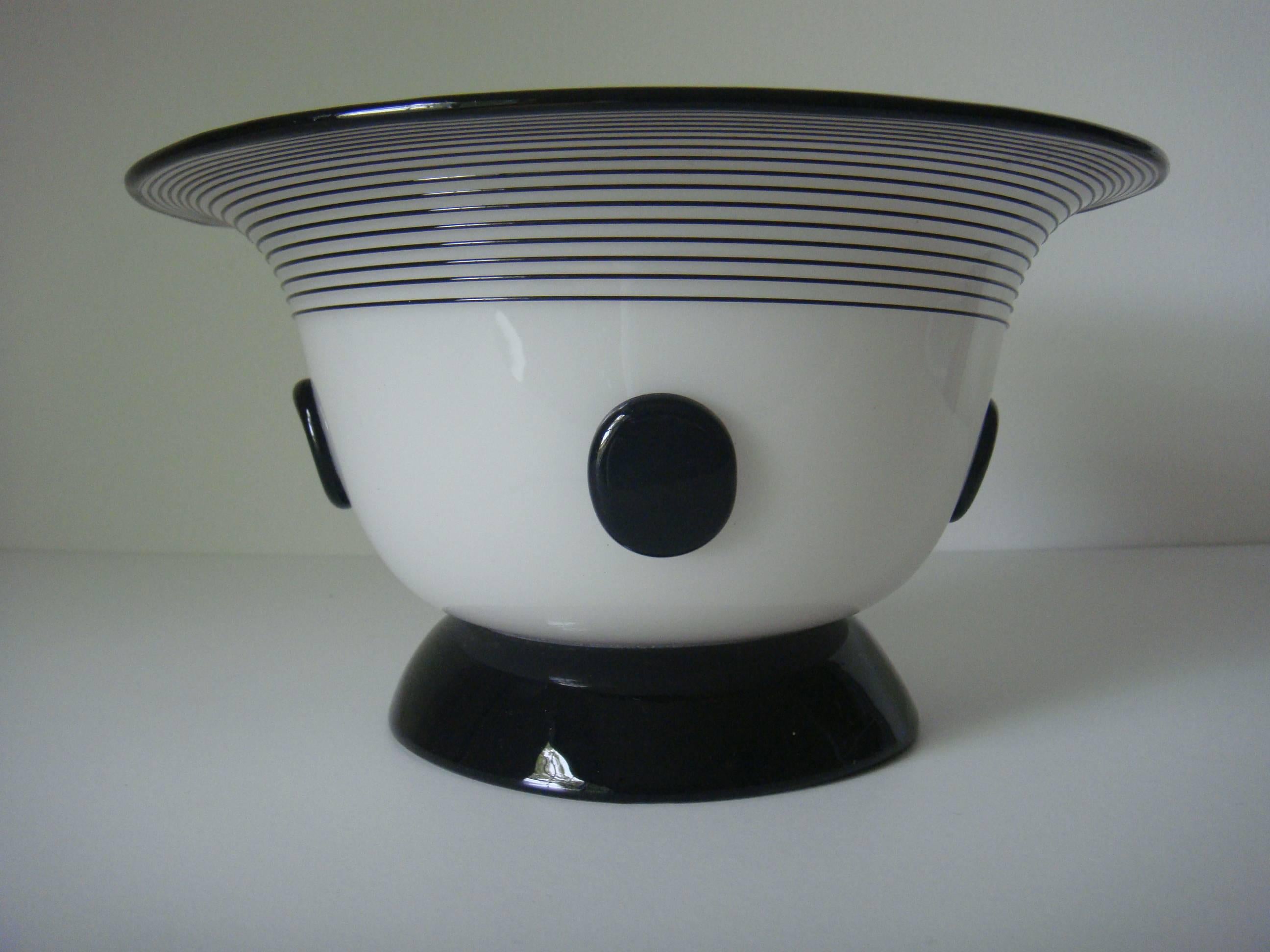 Loetz milk glass compote with black threading, coin appliques, and base by Michael Powolny. One internal bubble burst on interior of bowl not felt on exterior. As documented in November 1982 Catalog Galerie Wolfgang Ketterer Munchen.  Very large