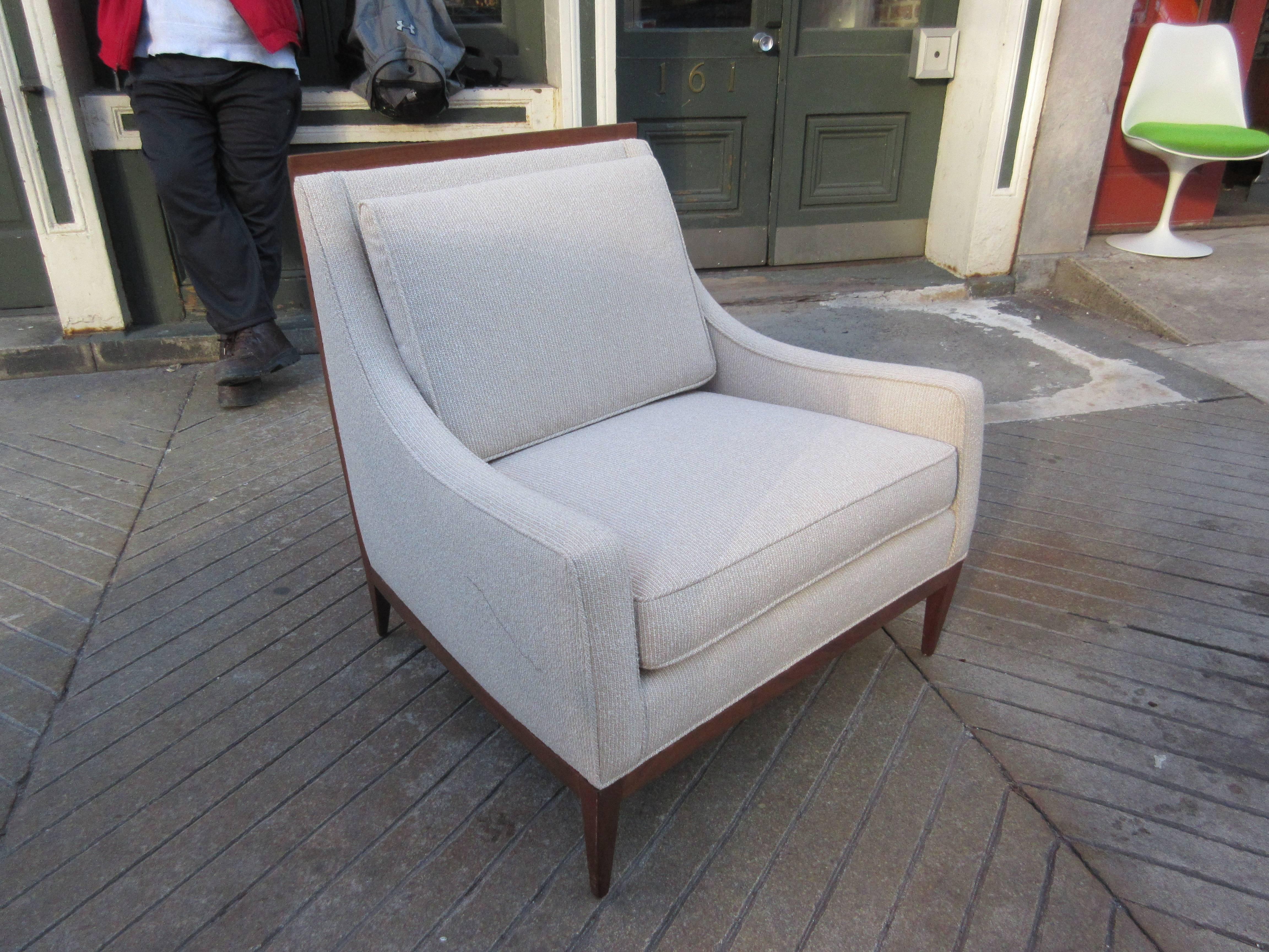 Largest of the Calvin lounge chairs by McCobb. Solid walnut frame with newly redone upholstery.