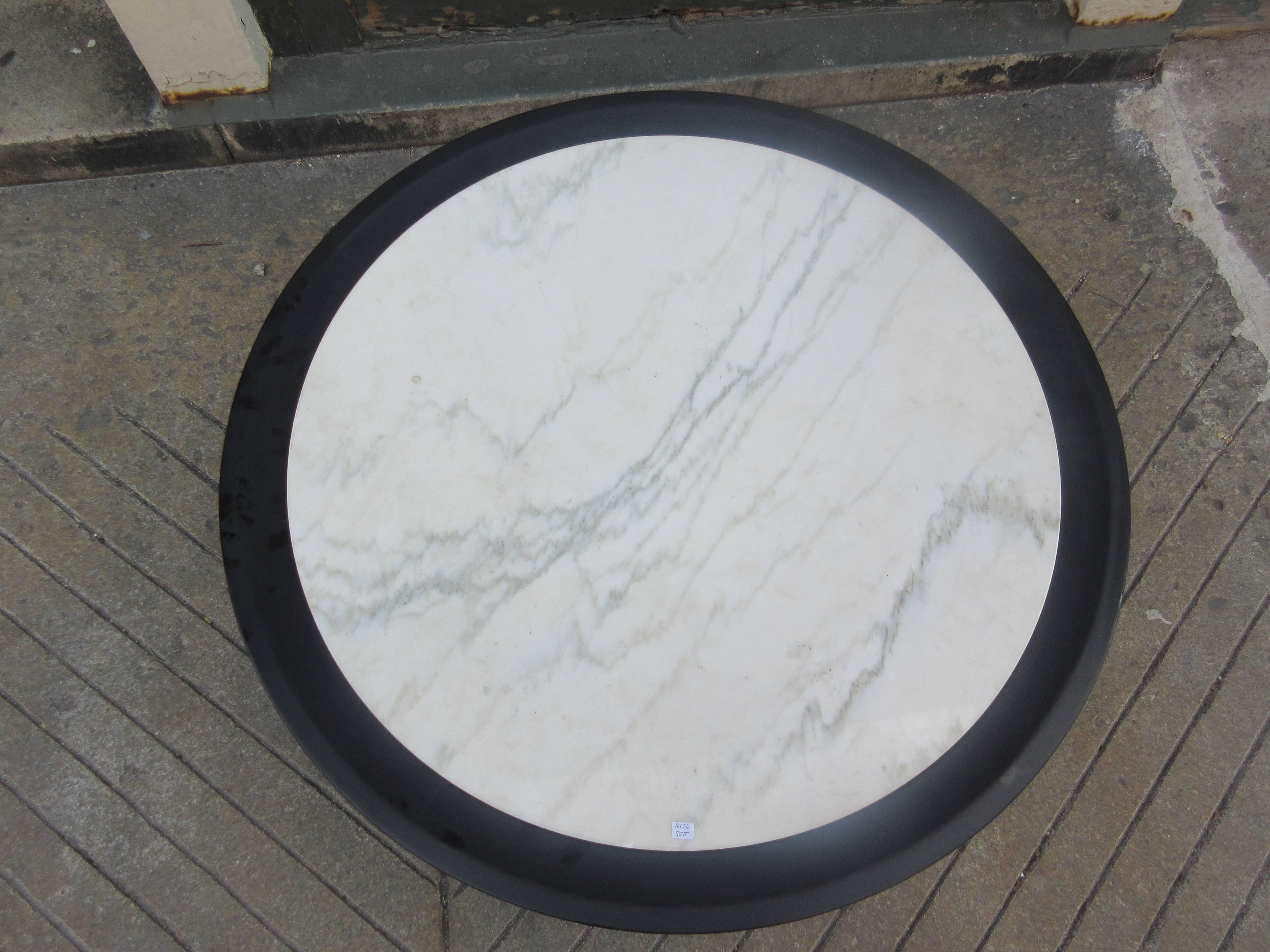 Warsaw Furniture Company 1950s round marble topped coffee table in the Chinese style. Wood is a satin black with white Carrara marble inserted in a fluted rim.