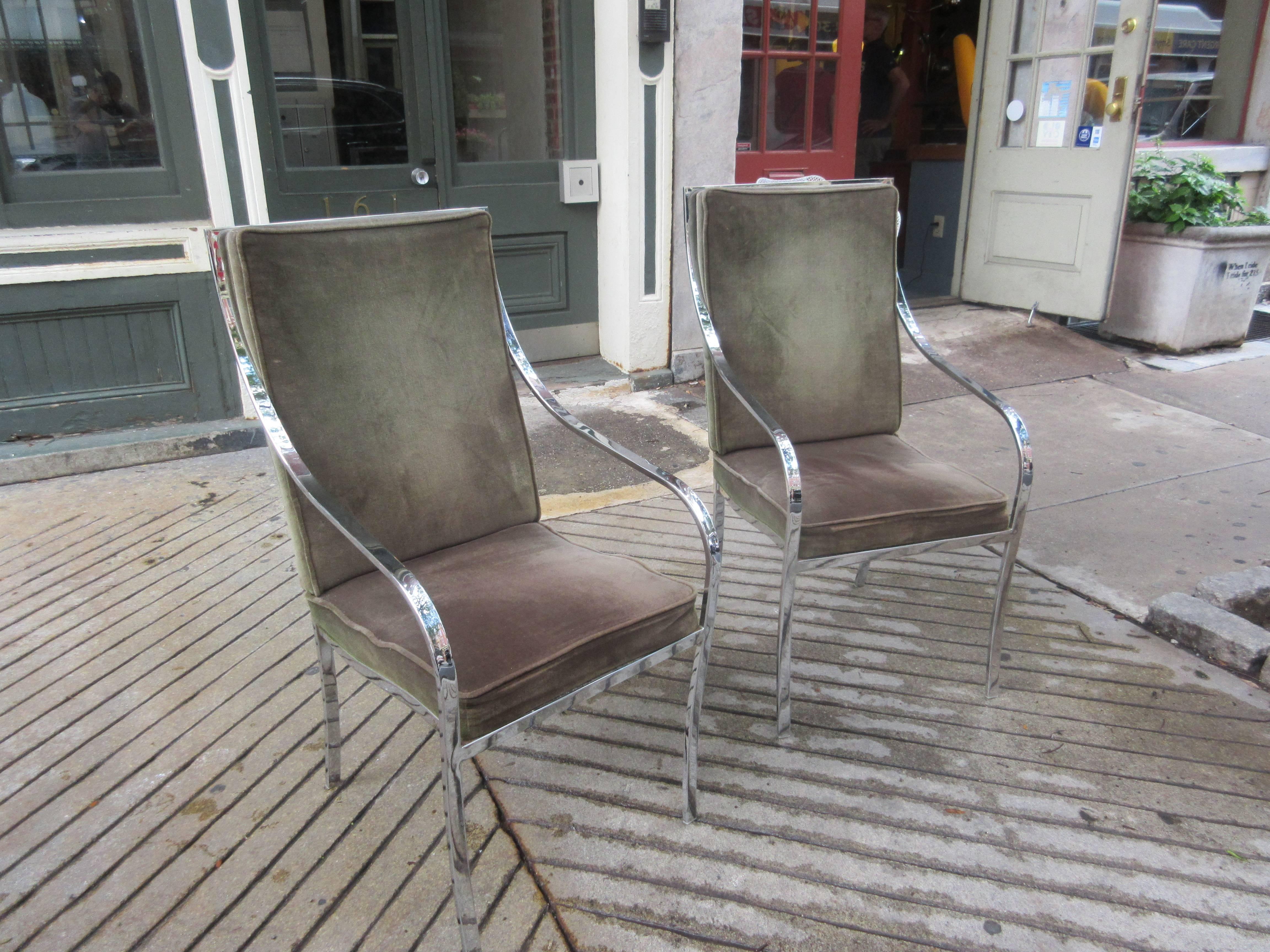Very dramatic set of Baughman armchairs with swooping chrome arms that flow from the backs of the chairs. Original in every way right down to their Thayer Coggin labels! Fabric shows their age but still usable if desired! Would consider selling in