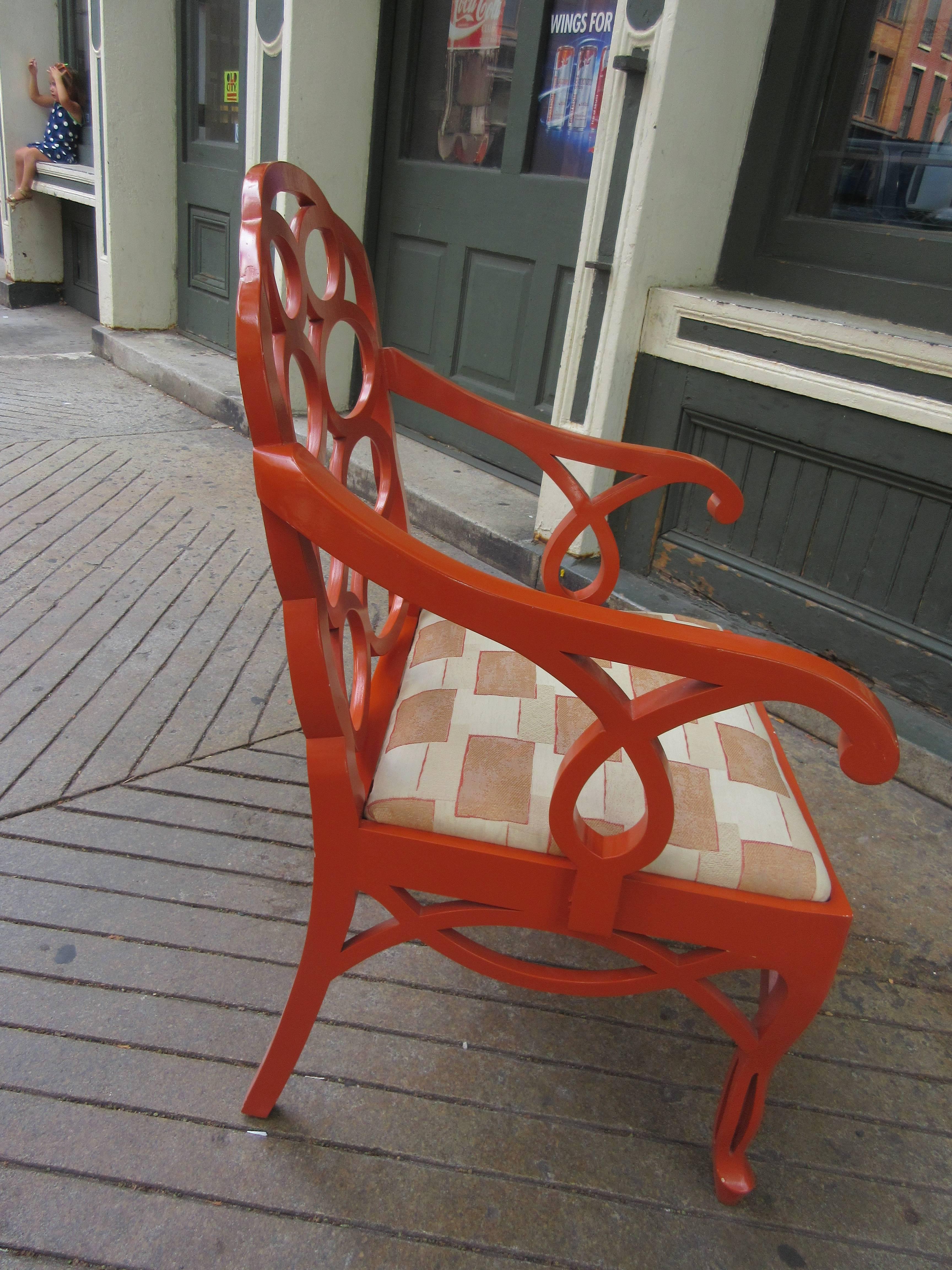 Loop chair designed by Franses Elkins in the 1950s with this one from the 1960s in its period coral paint and fabric.