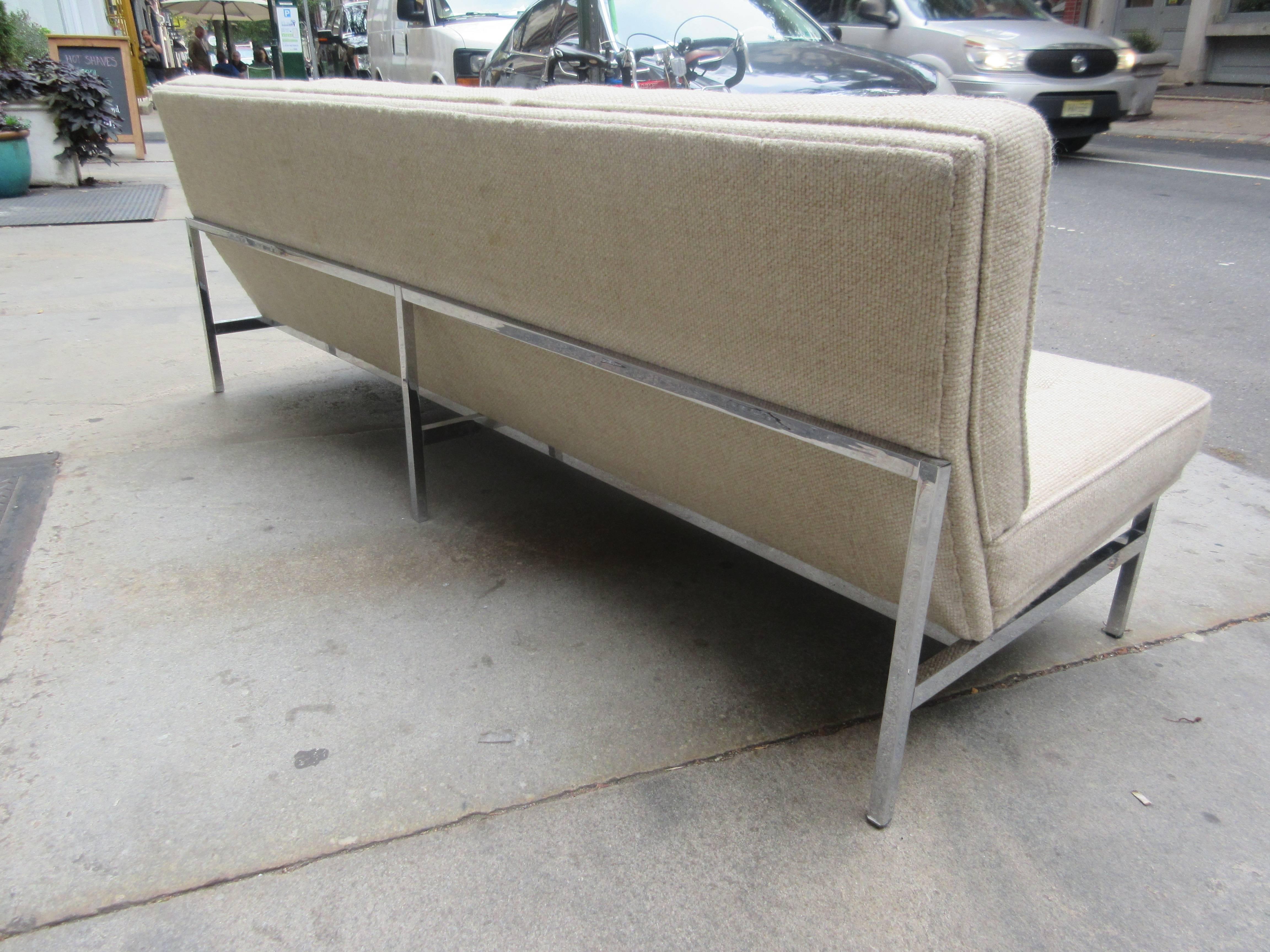 Tufted sofa in original large weave ivory fabric on chrome supports retains original 1974 production tag.