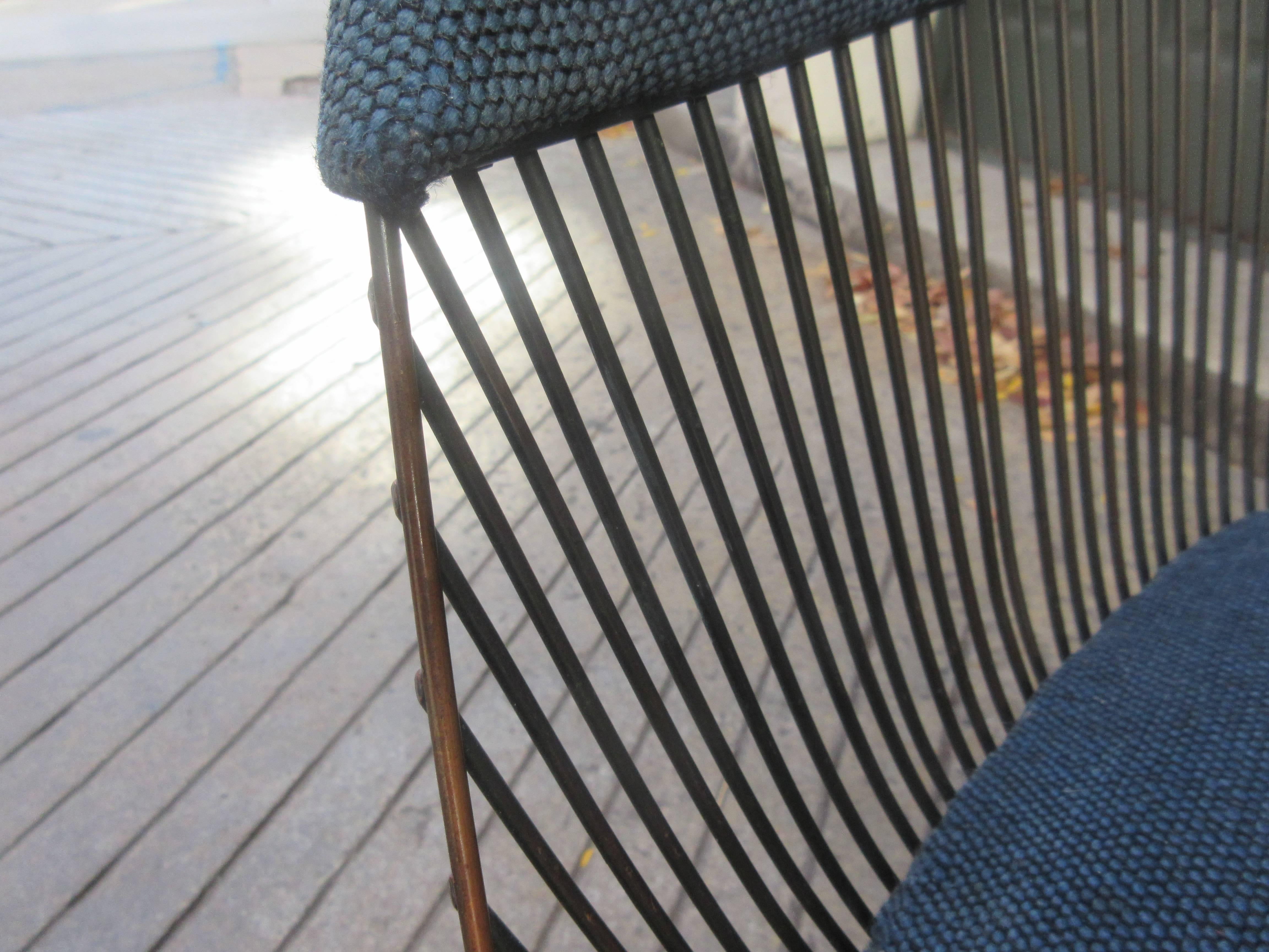 First year Production of the Platner Dining Chairs bought in 1966 by a Philadelphia designer. We purchased them from her son. The original steel grey blue fabric remains but is in need of replacement. The bronze finish steel is in excellent