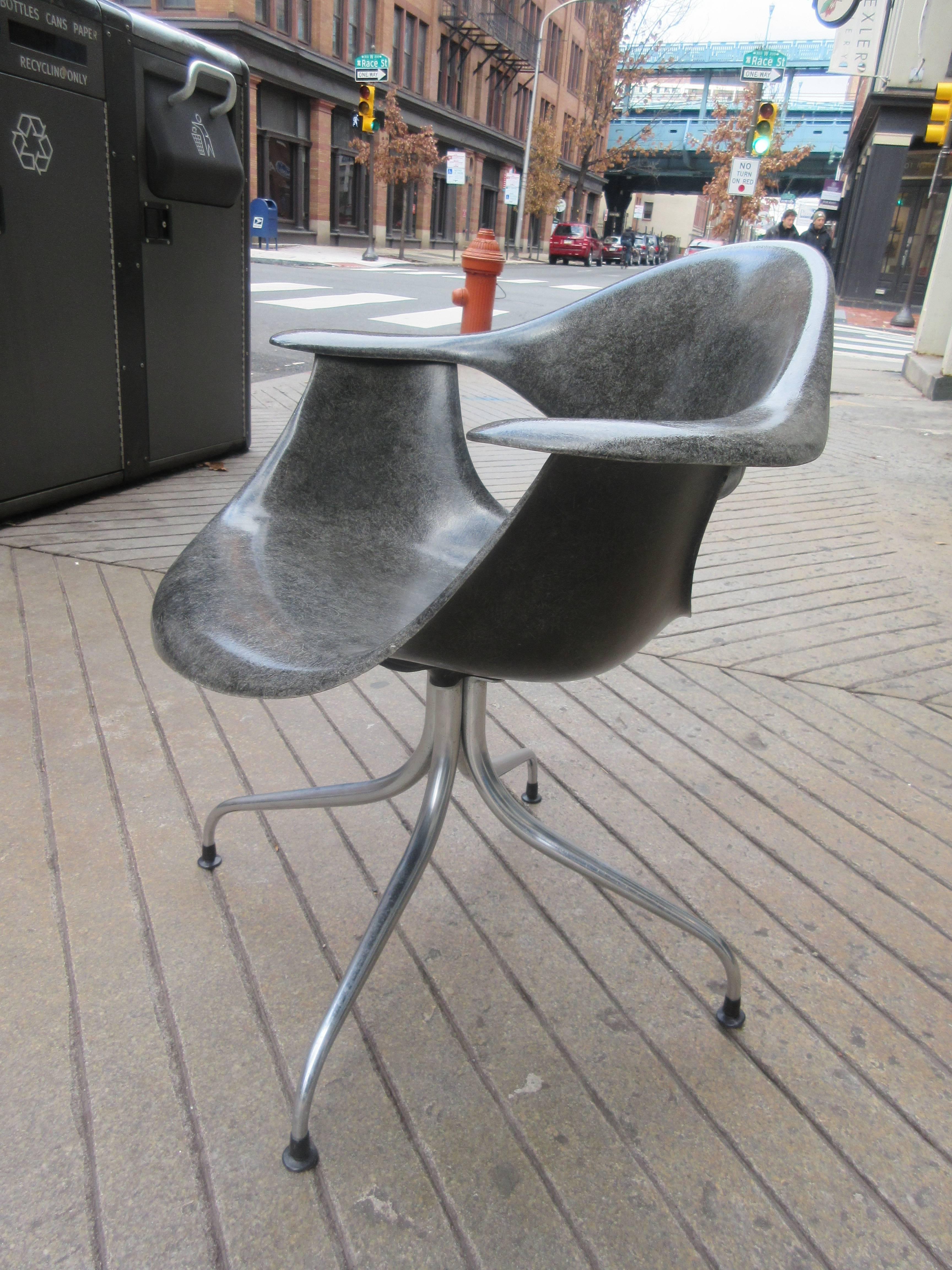 Nelson's Swag chairs with elephant grey fiberglass seat and back. Chair is all original and retains all for foot glides. Fiber glass is as good as it gets with no chips or fissures. Metal on legs is excellent.