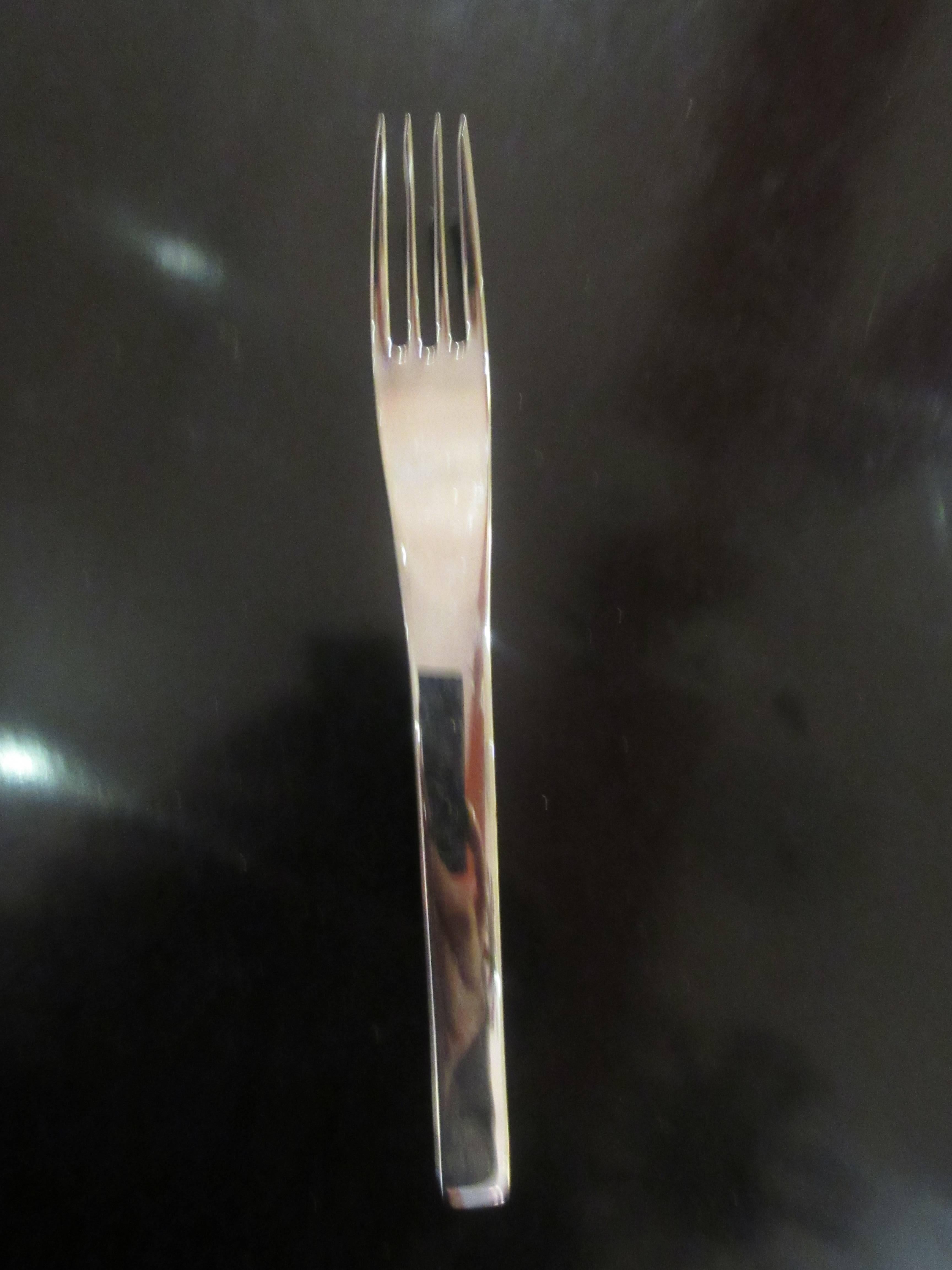 Cromargan stainless was developed by WMF in 1927 and is still a marvel that stays shinny and will not rust. This set evokes the Jacobsen 1957 set from Georg Jensen. This is a never used service for eight with five pieces per place setting for a