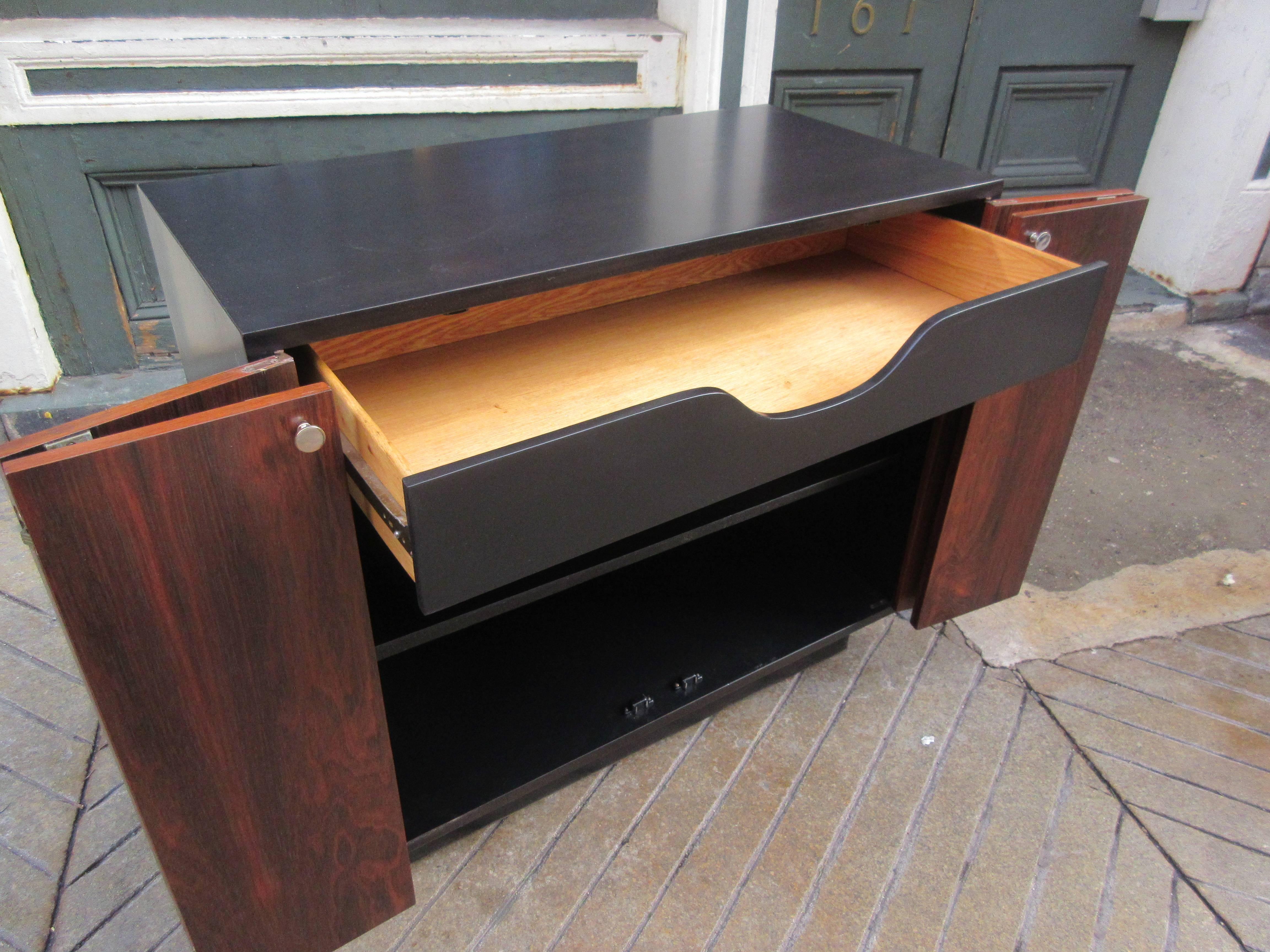 Harvey Probber Rosewood and Ebonized Wood Cabinet with Bifold Doors In Excellent Condition In Philadelphia, PA