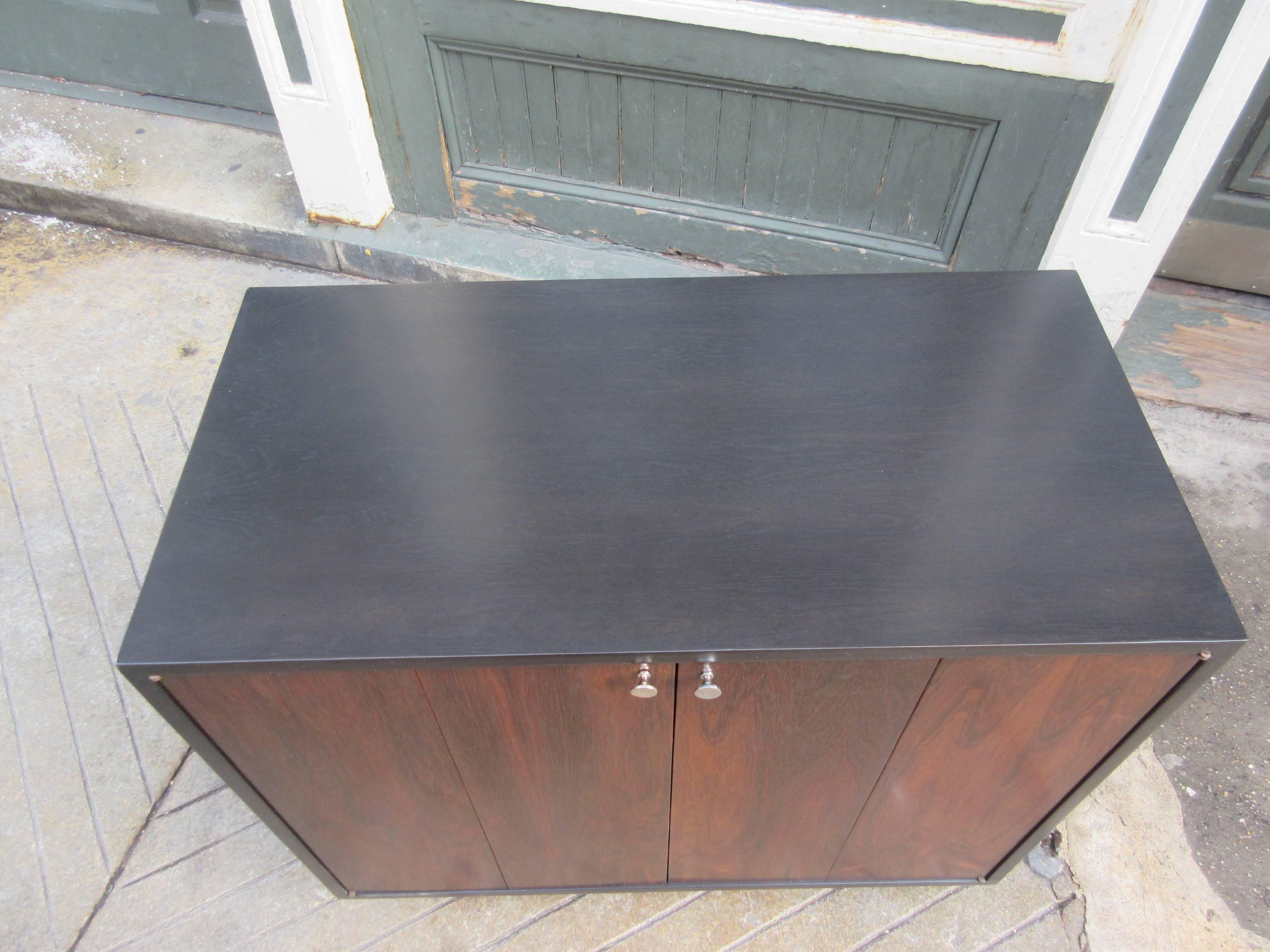 Mid-20th Century Harvey Probber Rosewood and Ebonized Wood Cabinet with Bifold Doors