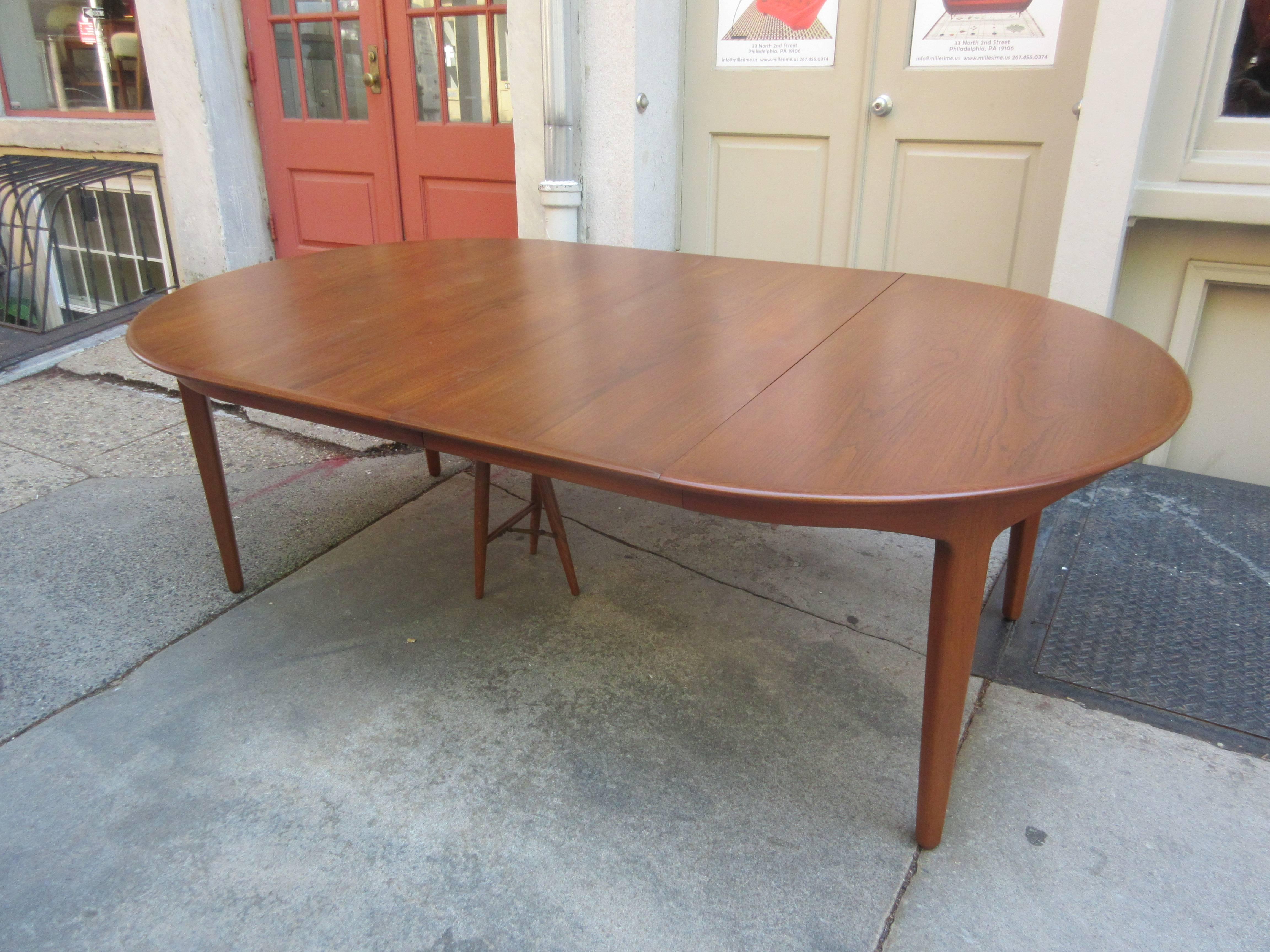 Henning Kjaernulf Teak Round Table with Four Leaves In Excellent Condition In Philadelphia, PA