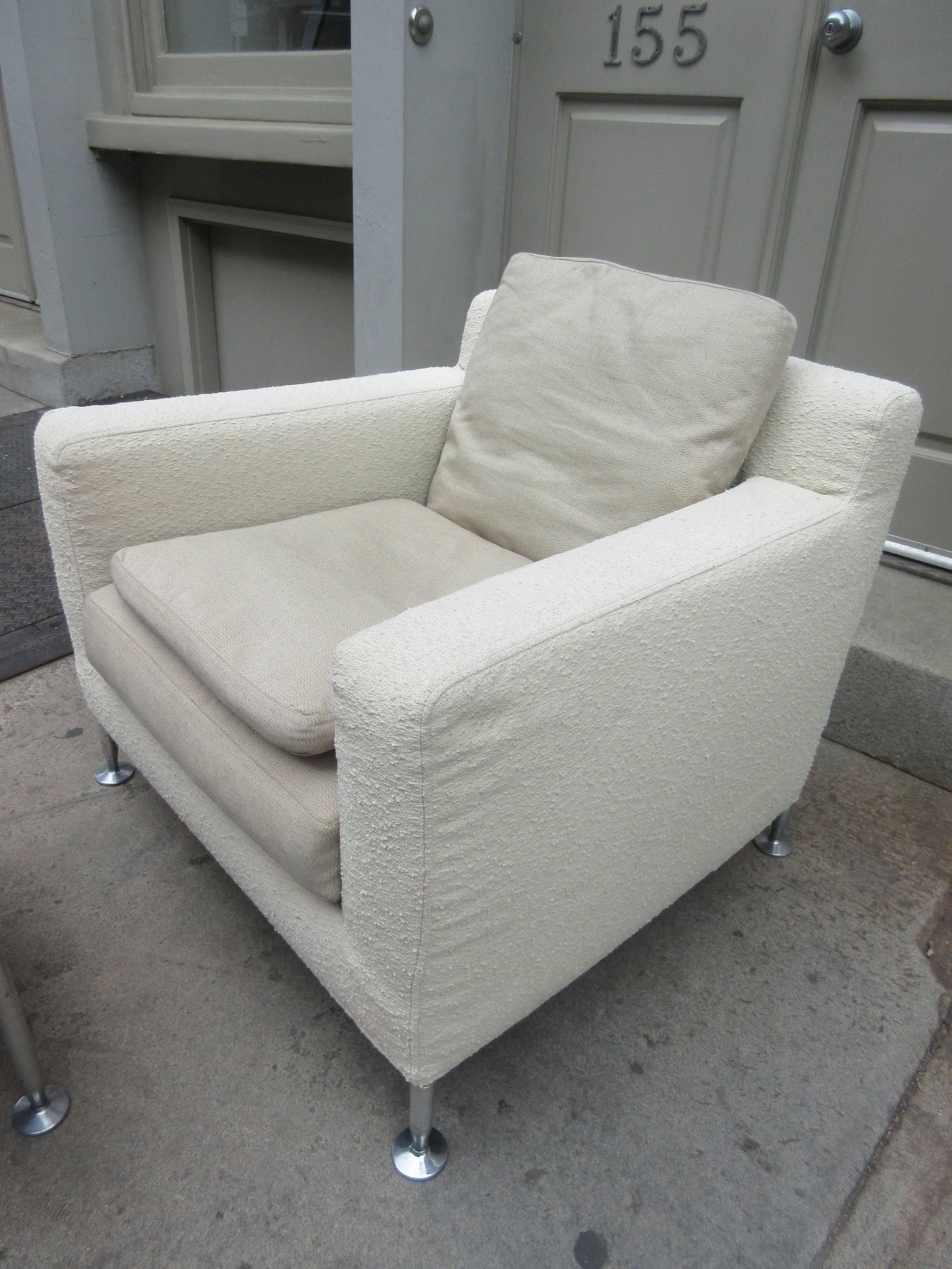 Antonio Citterio for B&B Italia Harry lounge chair and ottoman in a rough off-white bouclé and three loose cushions on chrome legs. Retains its tags. Comfortable contemporary seating. Ottoman is very diminutive 19 x 19 x 17, measurement listed