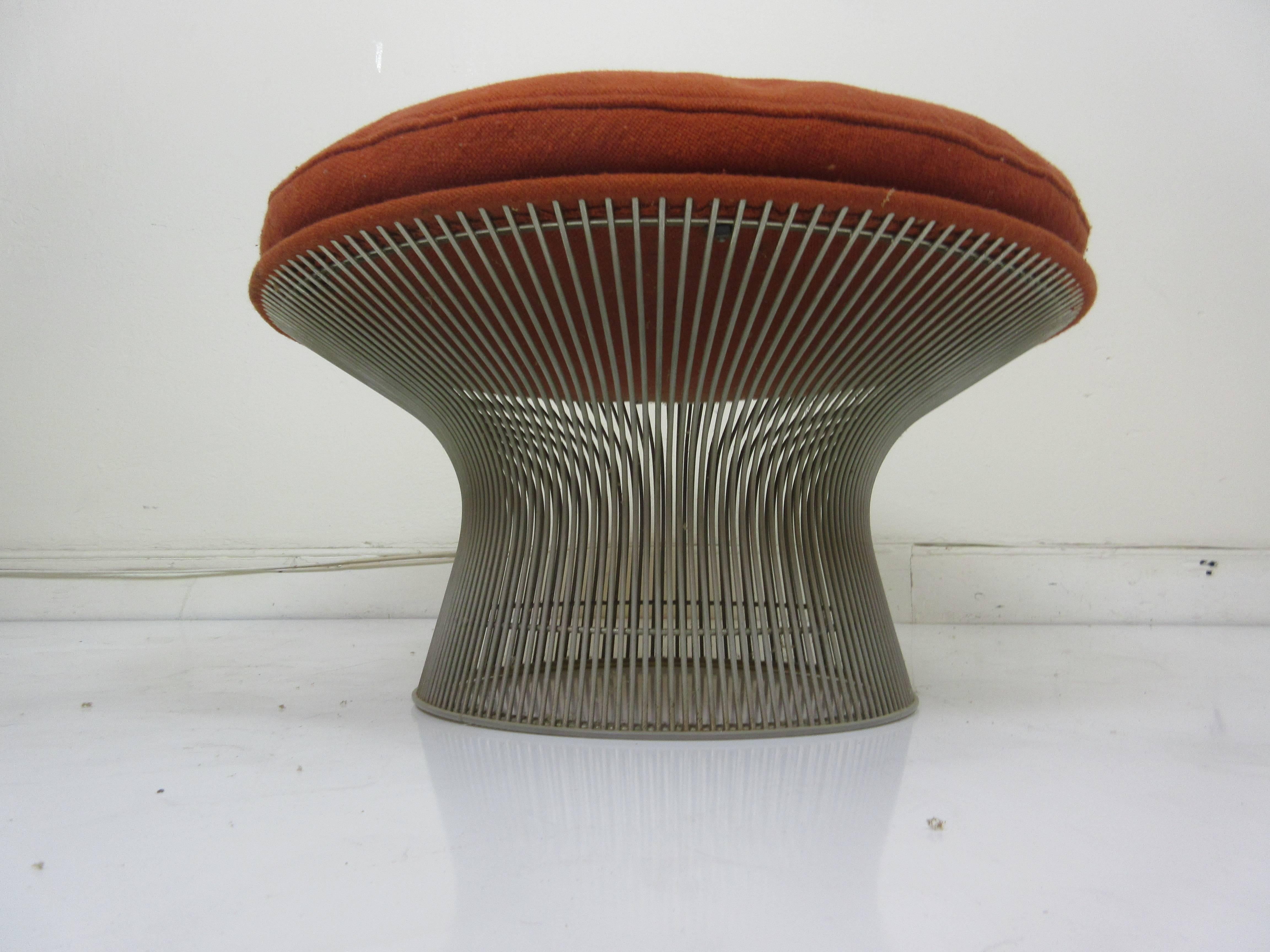 Warren Platner for Knoll International Ottoman in the nickel finish. All welds perfect and metal threads straight. Retains both its Knoll International label and plastic ring glide which is still pliable. Fabric is the original deep orange Knoll