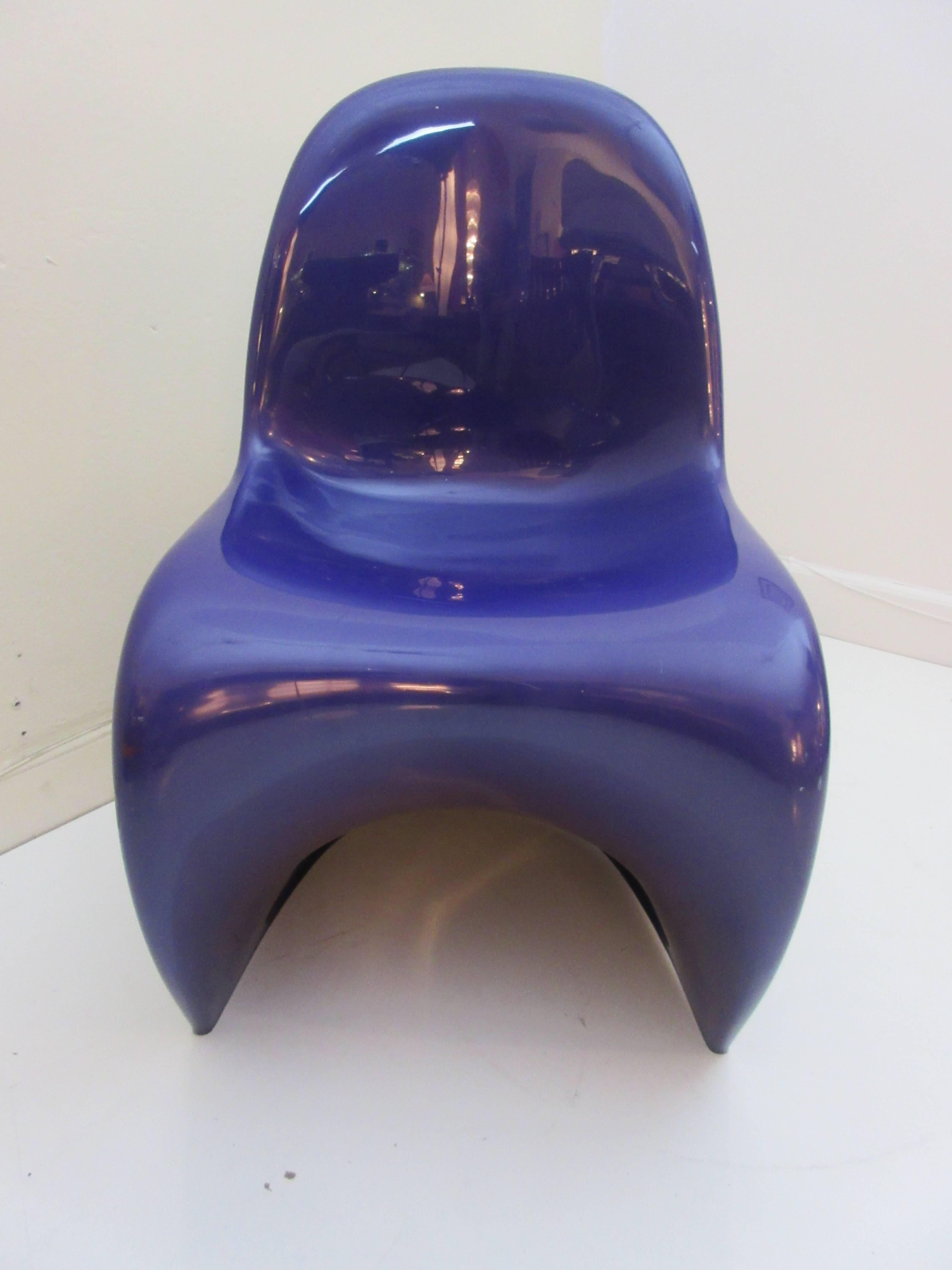 Verner Panton S Chair for Herman Miller a Fehlbaum Produced Chair as embossed in rare purple . The date of production is embossed on the underside in the plastic Nov. 1976. Ingeniously made from one continuous extruded thermoplastic form. Chair is