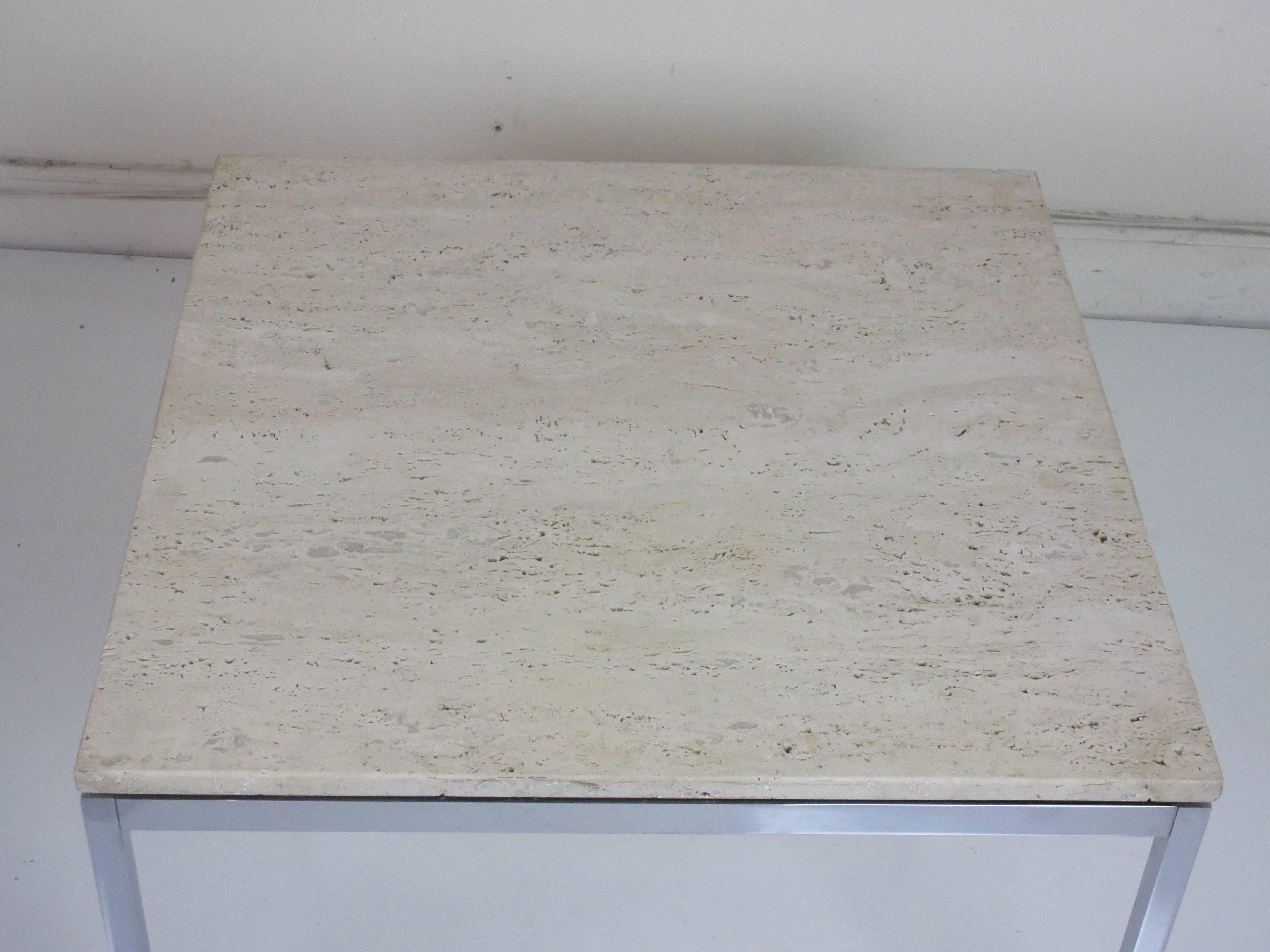 Florence Knoll Travertine and chrome side/coffee table for Knoll International. This elegant form with "floating" top is in excellent original condition no bleaching or stains common on travertine provides a somewhat warmer stone version