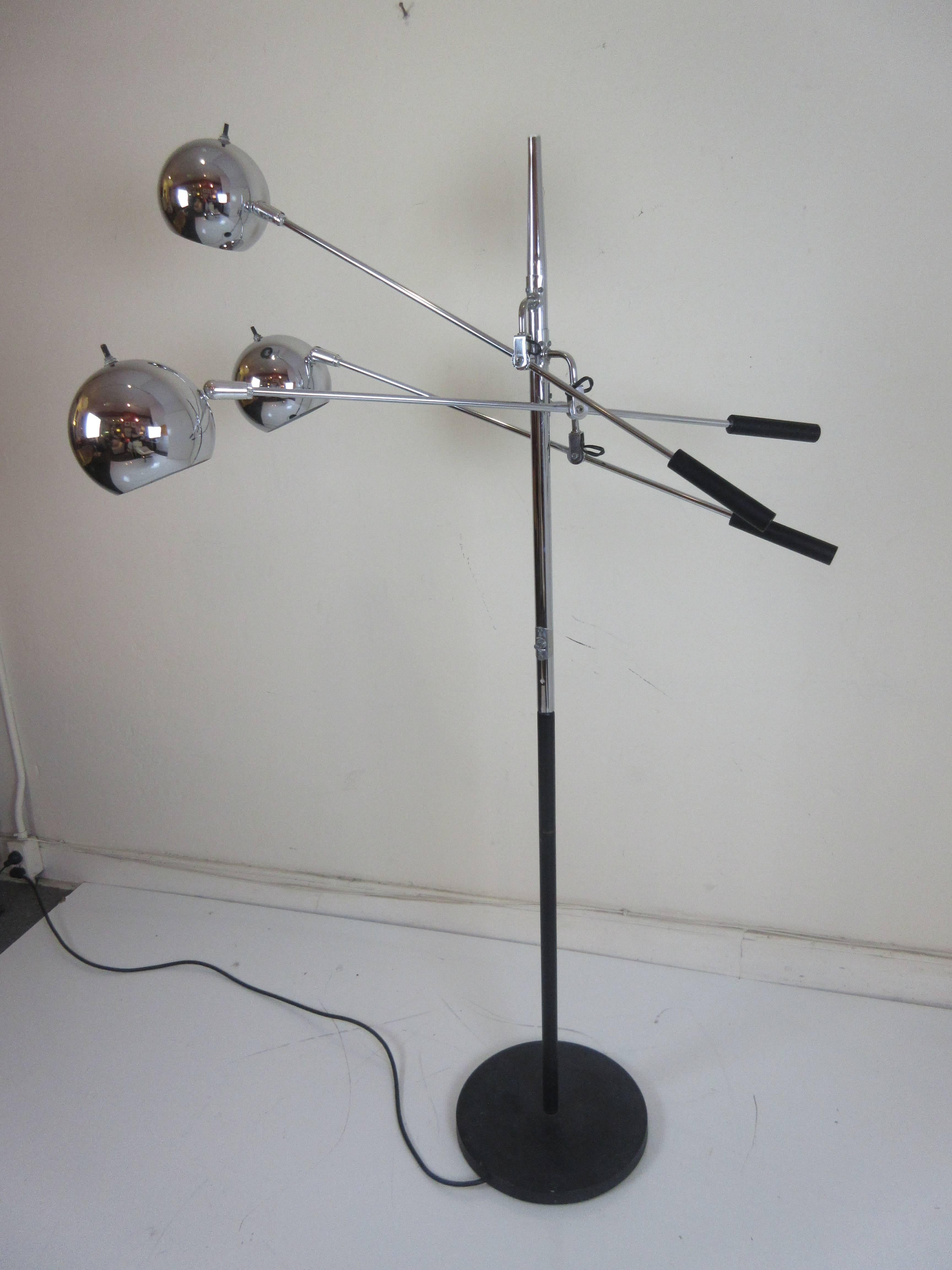 Robert Sonneman adjustable chrome floor lamp with three movable arms and shades. Switch on pole and individual shades. Black metal base and black weighted ends to each arm.