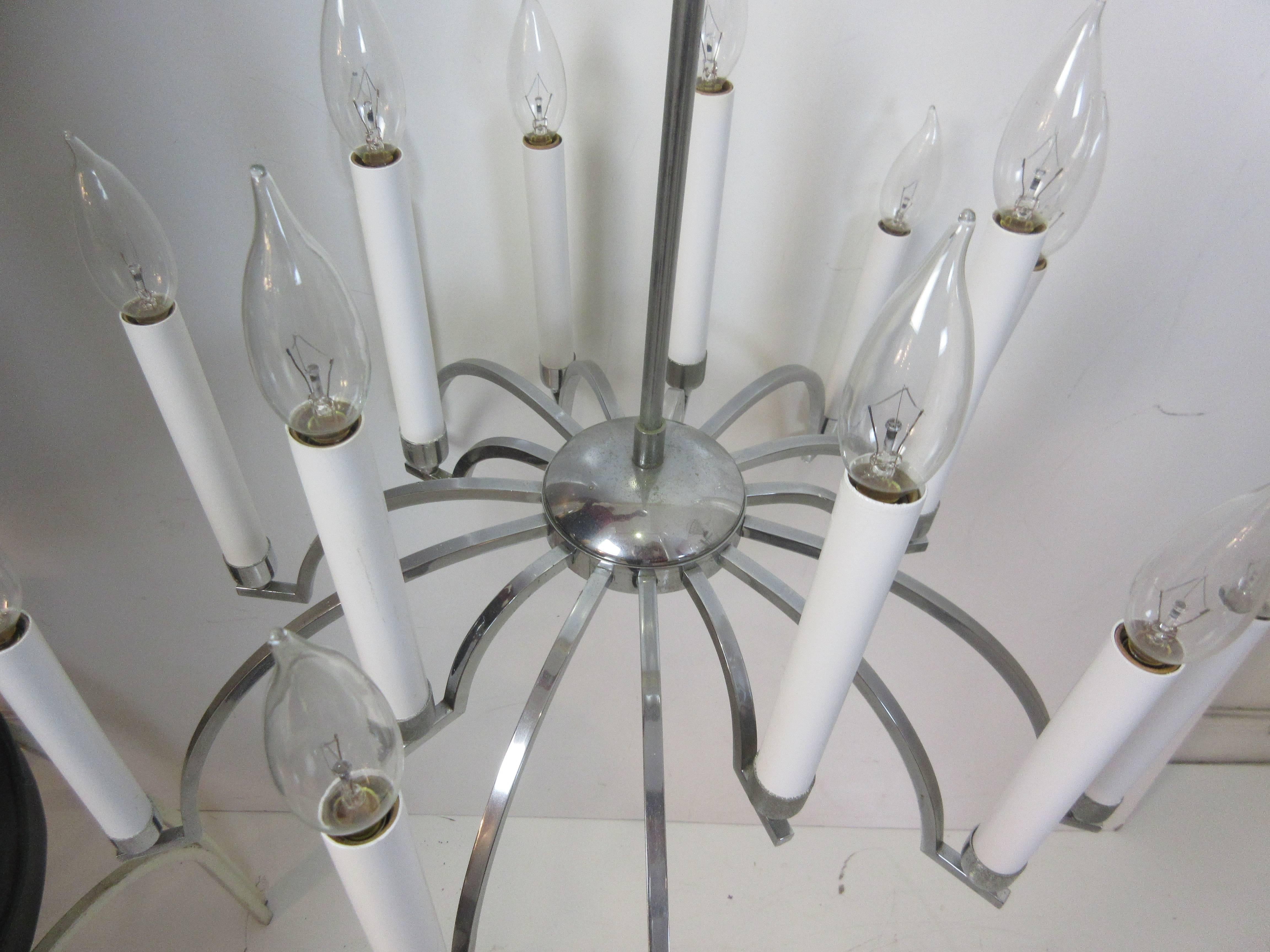 Gaetano Sciolari chrome chandelier with 16 candlesticks. Over 6 feet of chain with actual fixture being 25 inches tall.