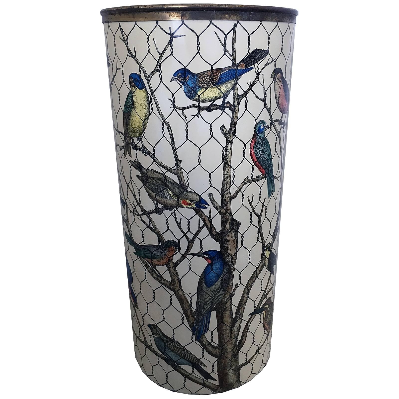 Vintage Fornasetti Umbrella stand
Colorful birds sitting on a tree branch
surrounded by chicken wire.
 