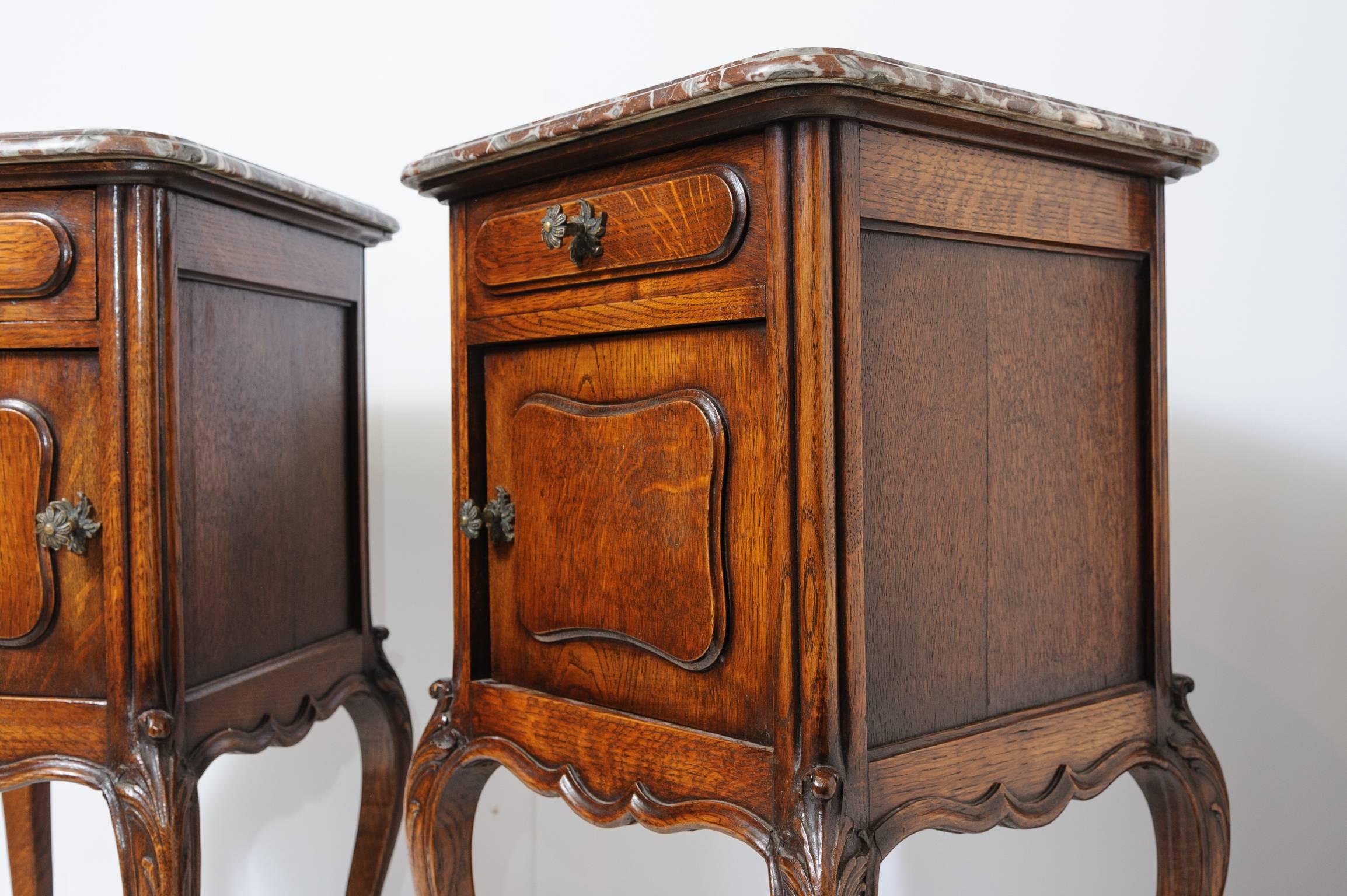 These are a very nice pair of solid oak French antique marble-top cabriolet legs night stands, circa 1890. Measurements: Each of these cabinets stand at 31