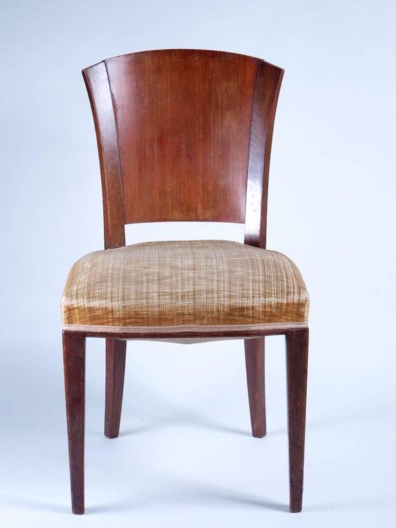 French Modernist Art Deco dining chairs, set of six, in rosewood and French walnut, circa 1932.

Please note that these chairs are unrestored in the photographs.
 
**PRICE includes proper restoration, refinishing and reupholstering with buyer