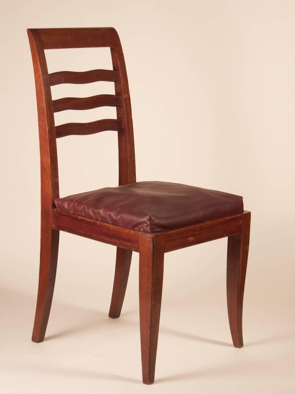 French Art Deco dining chairs, set of six, in mahogany, circa 1938.

Please note that these chairs are unrestored in the photographs.

**PRICE includes proper restoration, refinishing and reupholstering with buyer supplied fabric.
     