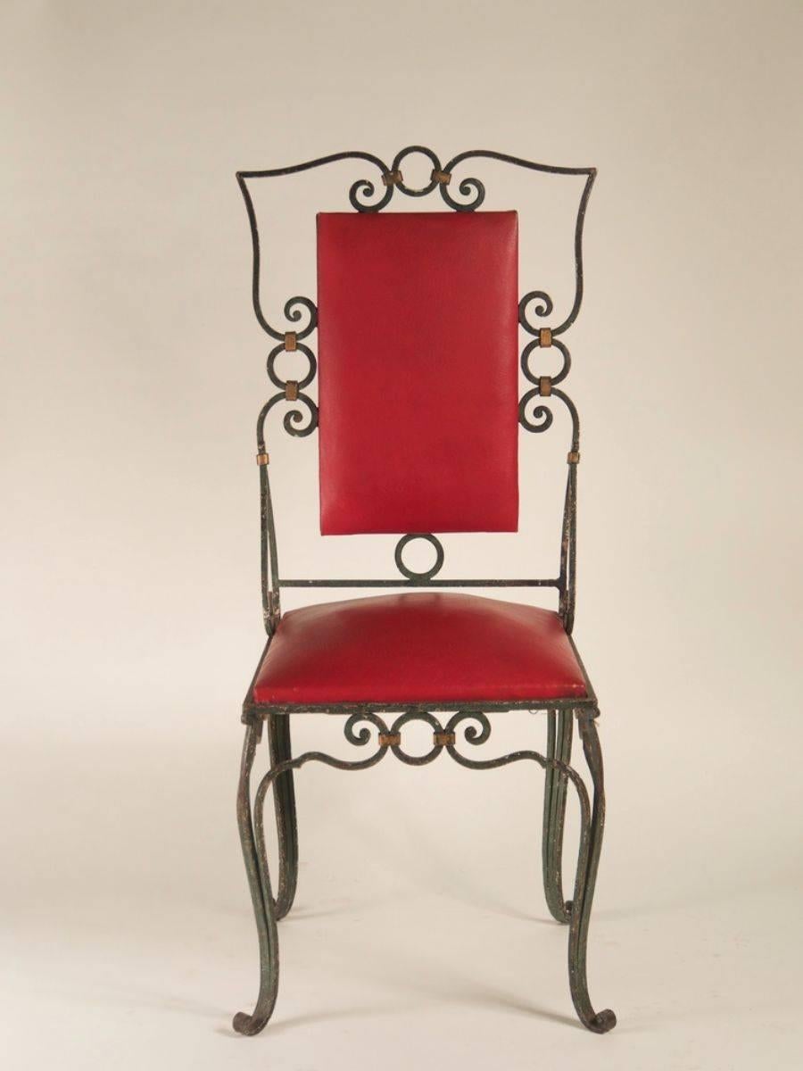 French 1940s Art Deco dining chairs, set of ten in forged iron. 

Please note these chairs are unrestored in the photographs. Chairs can be custom-stained. We will be happy to discuss your wood color preference.