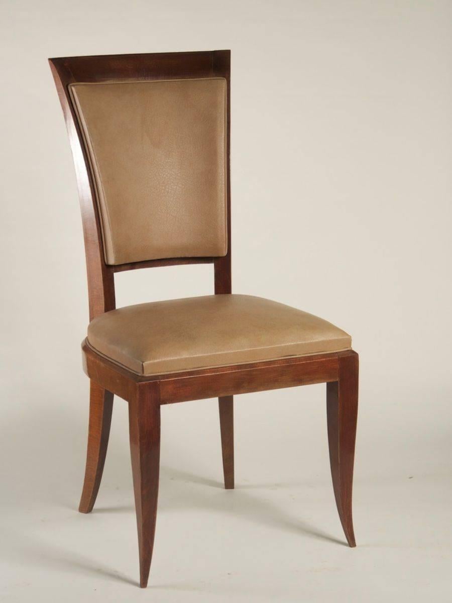 French 1940s Art Deco set of eight high-backed dining chairs in beech. Could be used with #1180, a strikingly similar set, to make a grouping of 12.

Please note these chairs are unrestored in the photographs.
 