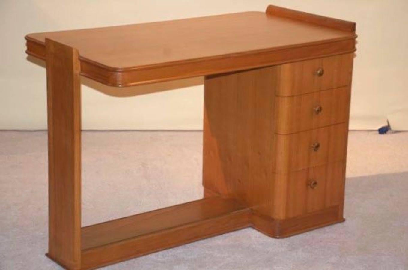 French Art Deco desk, circa 1935 by Dominique in Ceylonese lemonwood with bronze fittings. The guest side has a pull-out tablet area suitable for a laptop or tablet.