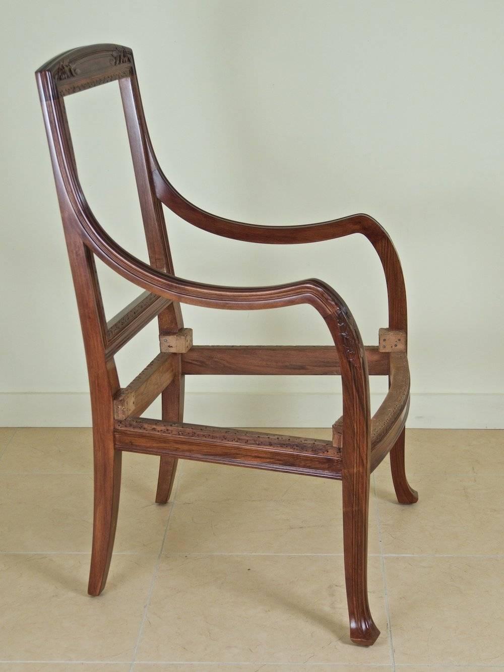 French Art Nouveau, circa 1900, pair of armchairs by Abel Landry for Maison Modern in sculpted French walnut. Frames have been restored and refinished.