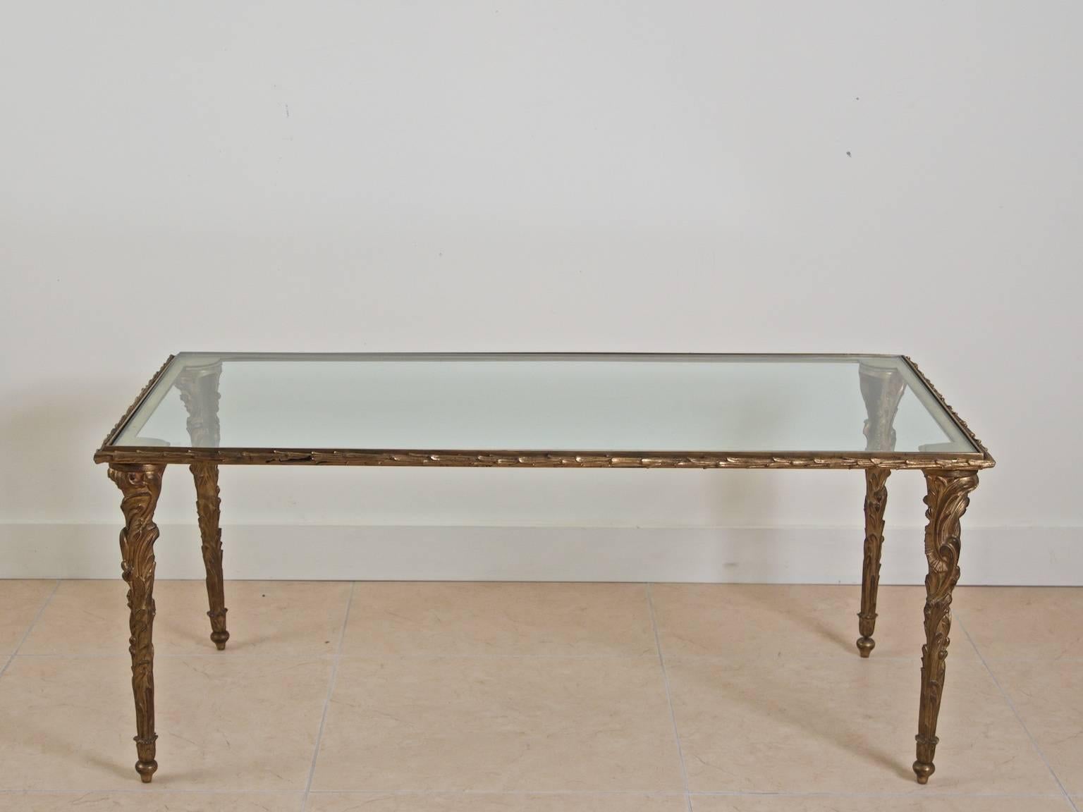 French 1940s Art Deco coffee table in gilt sculpted bronze.