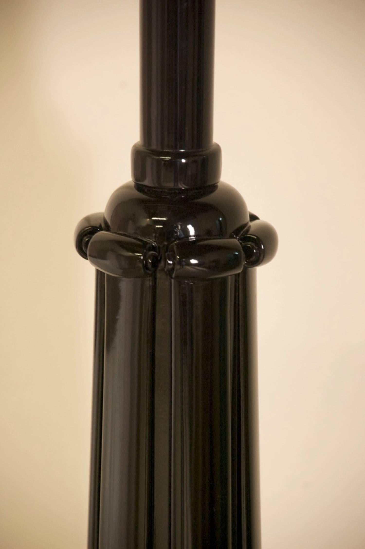 Classic French Art Deco floor lamp, circa 1925 by Süe et Mare, in black lacquer with sculptural details. Documented.

Height to top of shade is 74