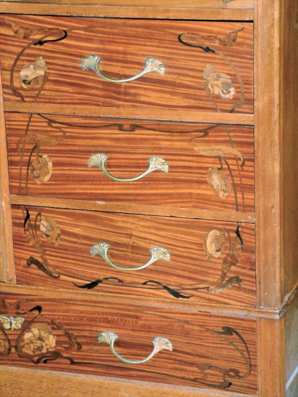 French Art Nouveau bedroom set in satinwood with exotic hardwood marquetry and bronze fittings. Designed by Abel Landry, circa 1900. 

Armoire is 47