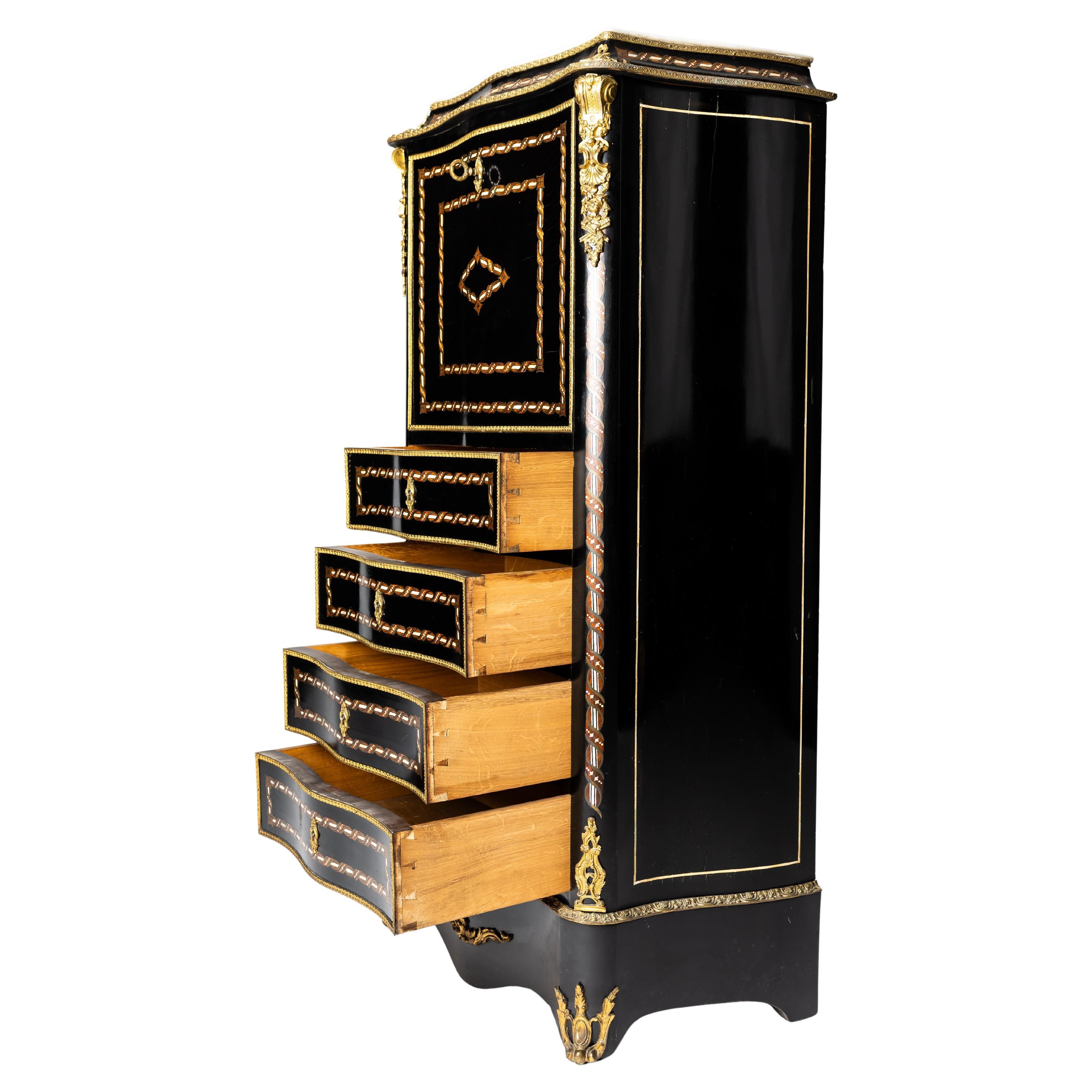 A masterpiece of French craftsmanship - a Napoleon III era ladies writing secretary desk, circa 1860.

The piece of furniture has a slender, high structure, with a richly decorated front and sides that are also finished. The front in particular