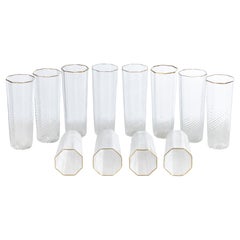 Important set of 12 glasses, tableware, gold, Murano design Venini, 1970s Italy
