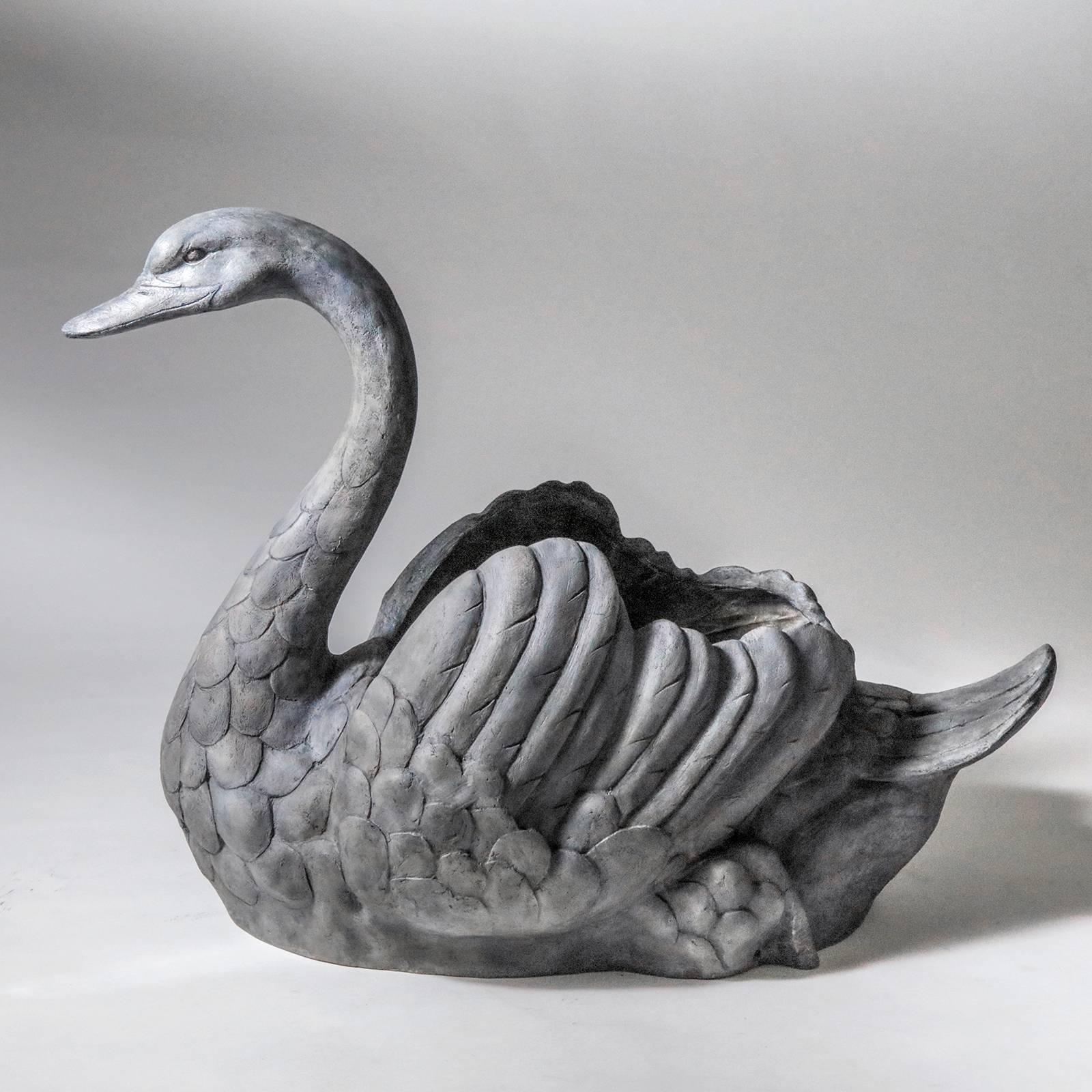 One-of-a-kind pair of identically matched large swan planters. Created in a resin, then given a hand-painted distressed grey patina. From a Classic garden design that Linda has in her own garden! Re-creation exclusive to Linda Horn.