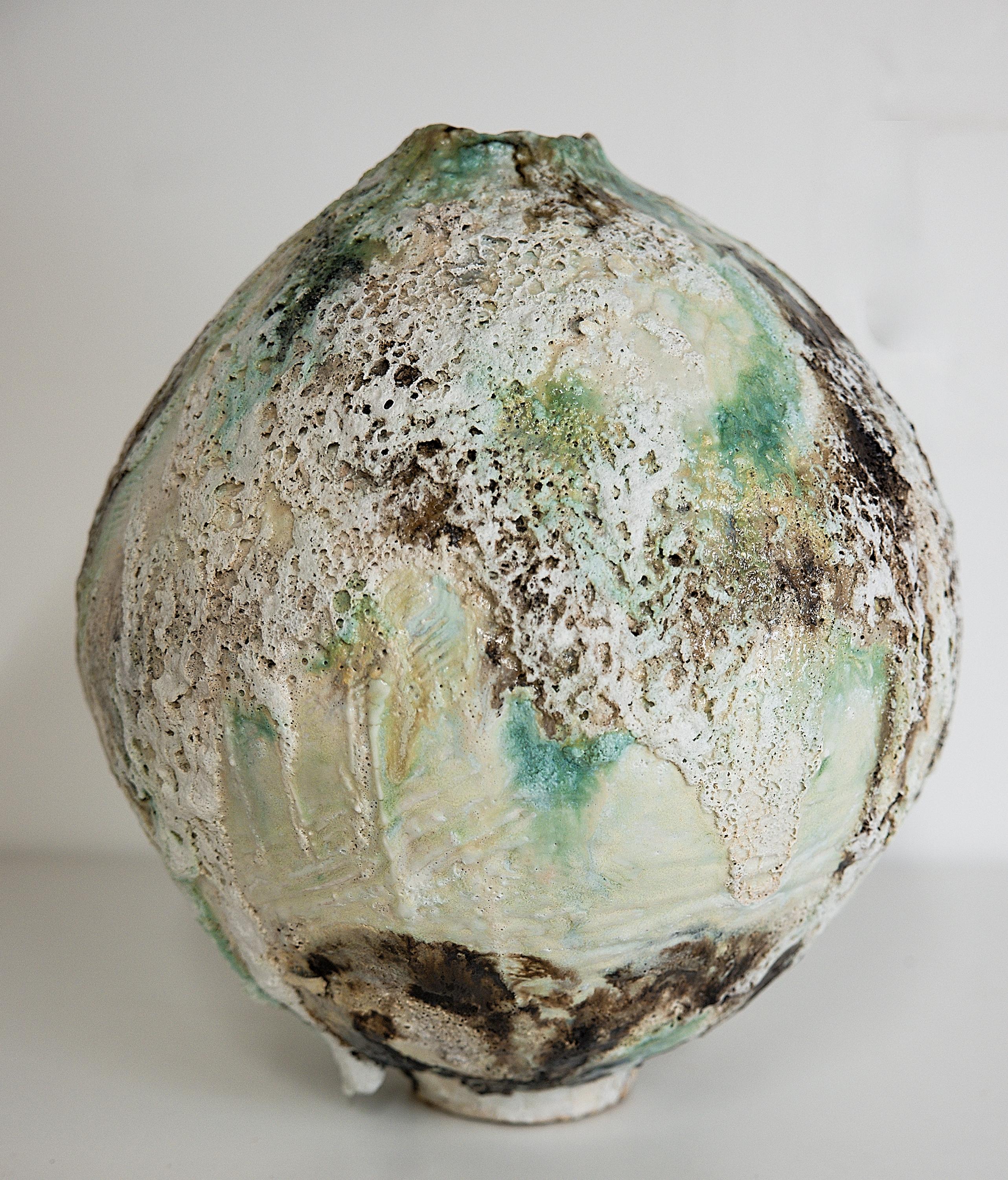 WOODLAND SERIES 

Large Moon Vase approx 16inches tall x 14.6 inches wide
Heavy: 26 lbs
a mix of traditional with organic modern this Large Moon jar  shape with texture and many layers of custom glazes. some raw clay, oxides, volcanic glaze
TEST FOR