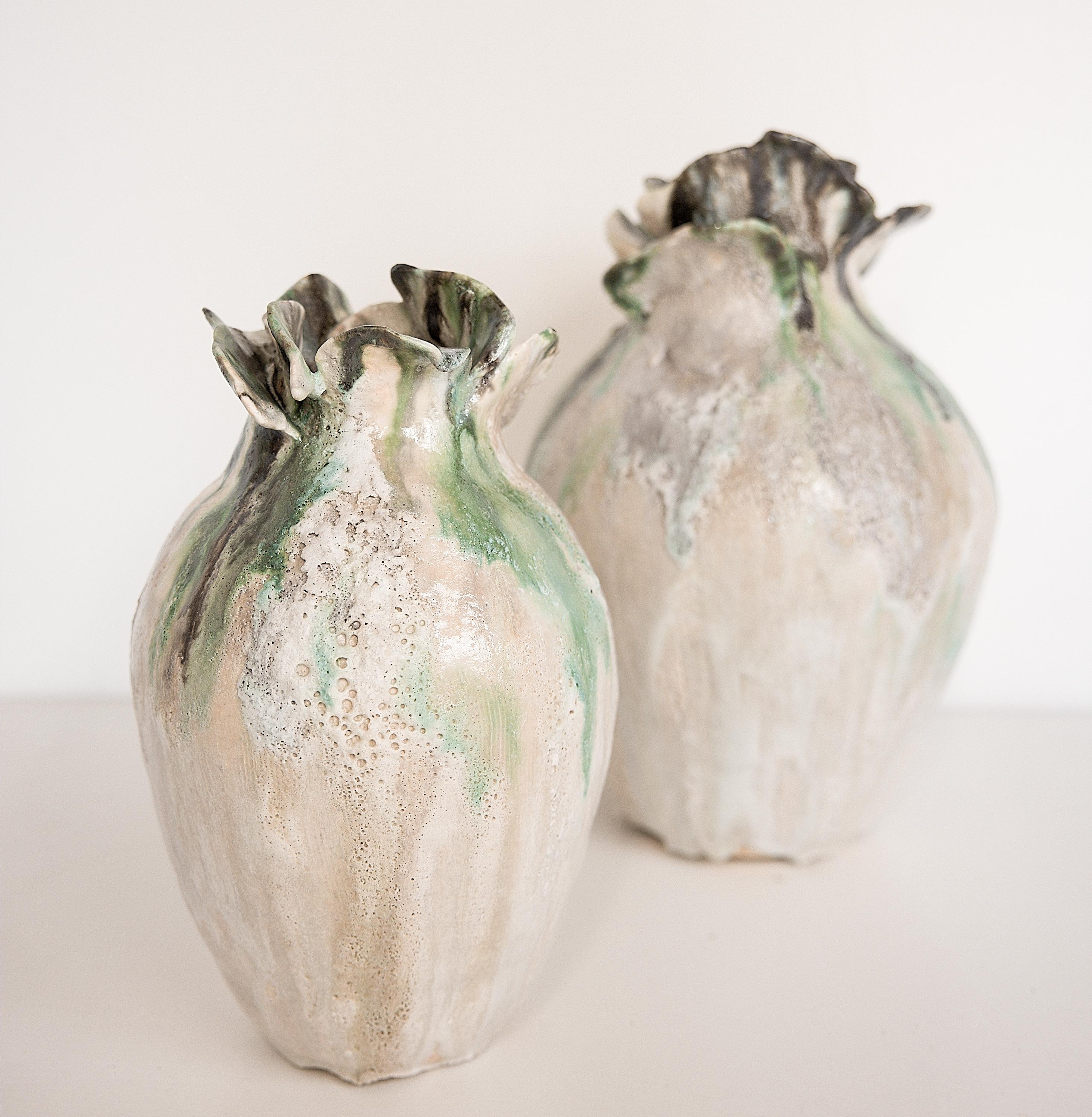 Bring a touch of modern style to your home with our Yeonhwa Jars. ( Lotus Flower Jars)
. Part of our permanent collection, each striking vase features a unique, moon-like design in an eye-catching light lava glaze.
Please select your size, Each one