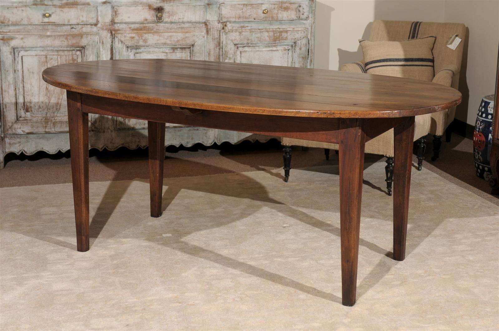 19th Century Walnut Dining Table from France, circa 1880
The main attribute of this table is the very pretty old French walnut with a nice variation in color and a rich patina. It is very sturdy and seats six easily with a good overhang all the way