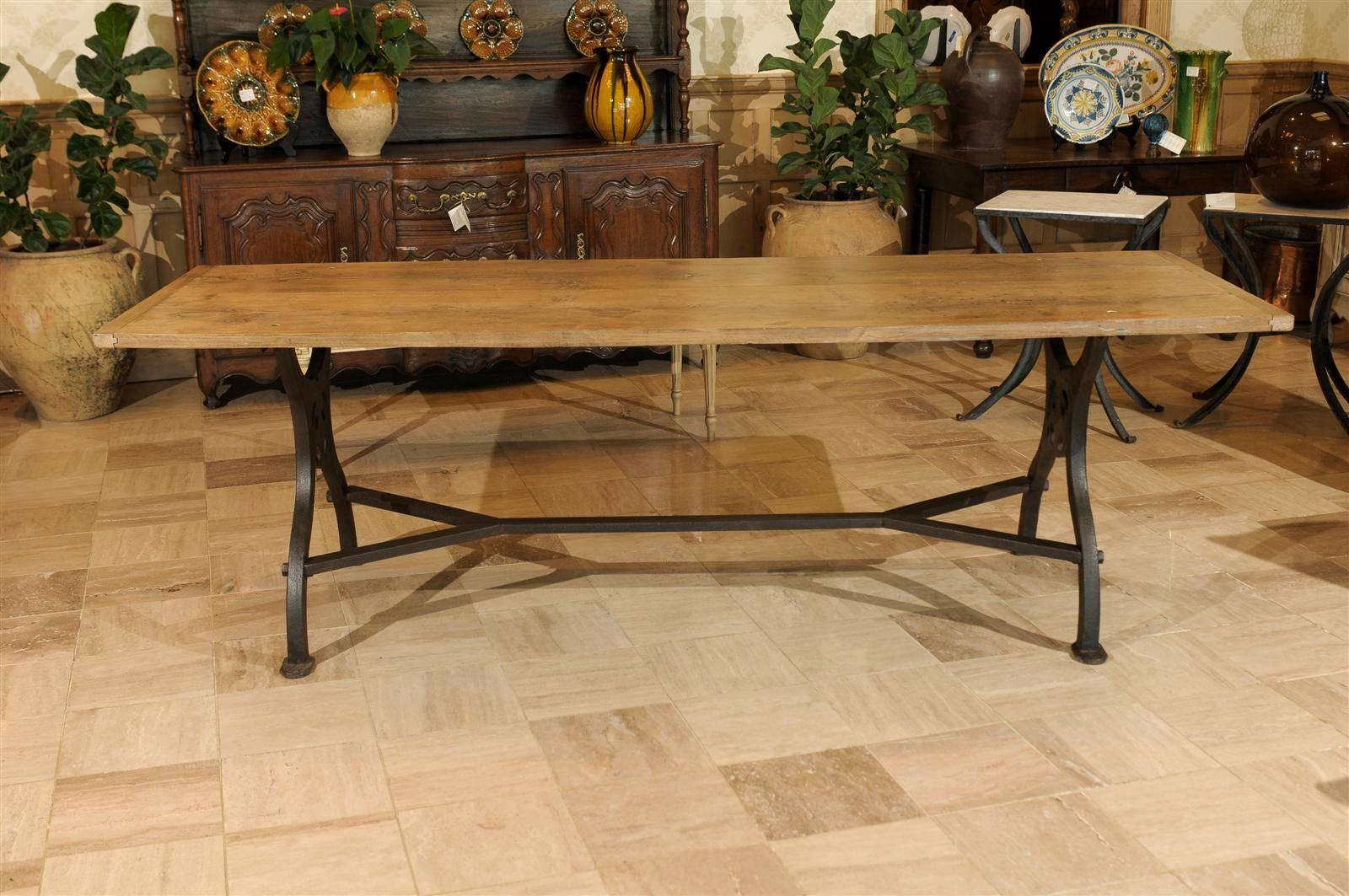 Cast Dining Table with Industrial Iron Base and an Old Wooden Top