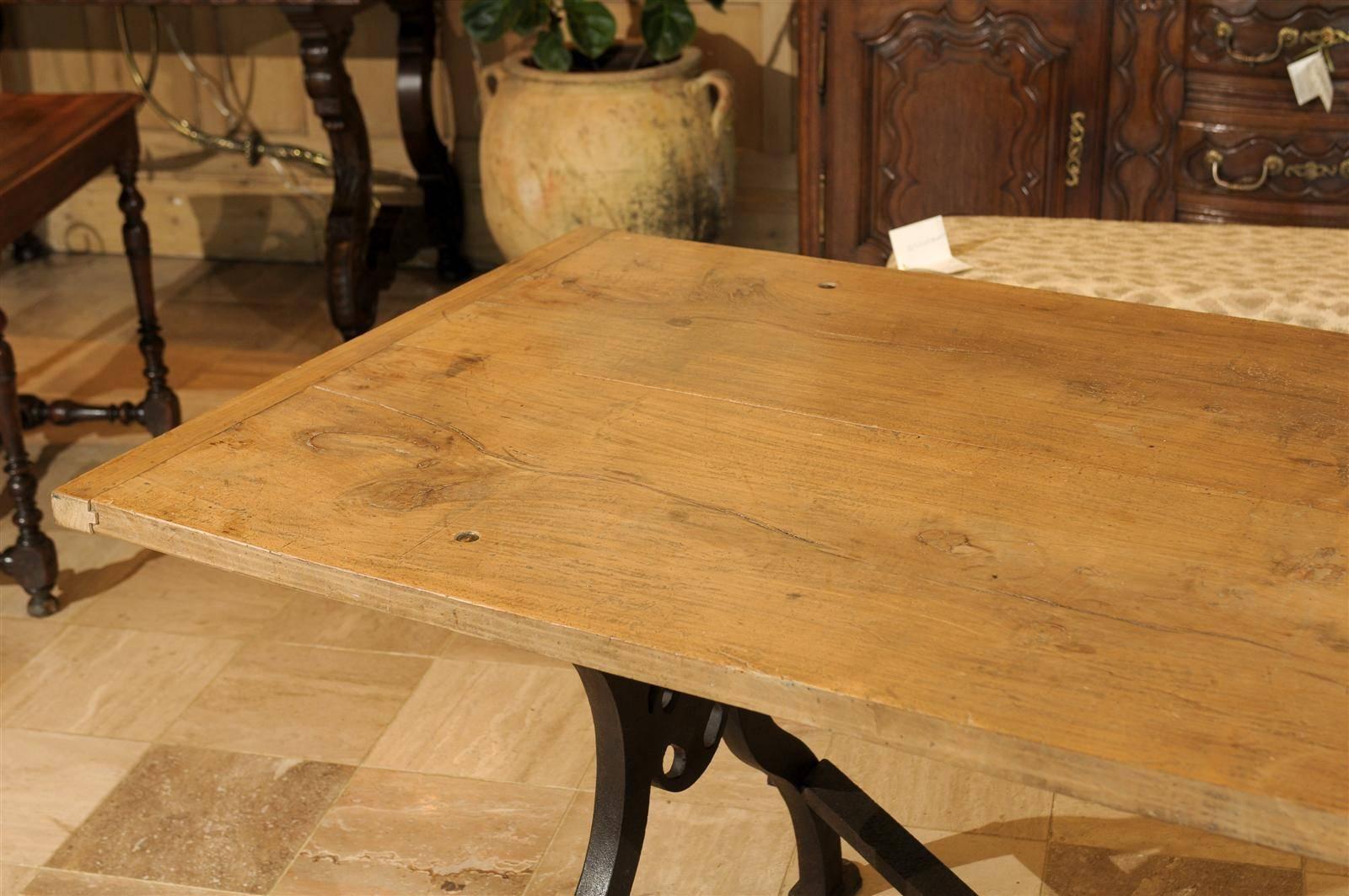 Dining Table with Industrial Iron Base and an Old Wooden Top 1