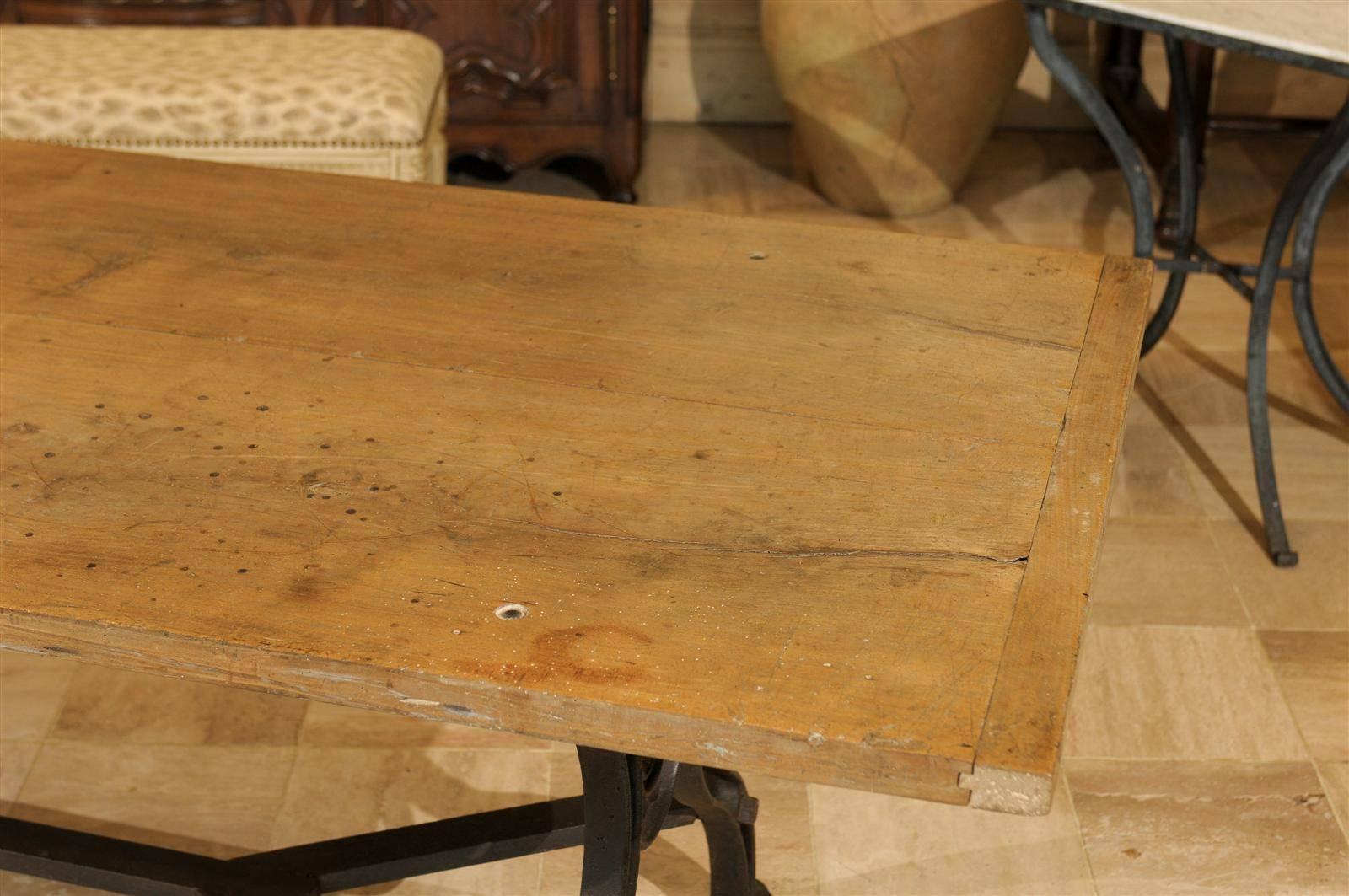 Dining Table with Industrial Iron Base and an Old Wooden Top 4