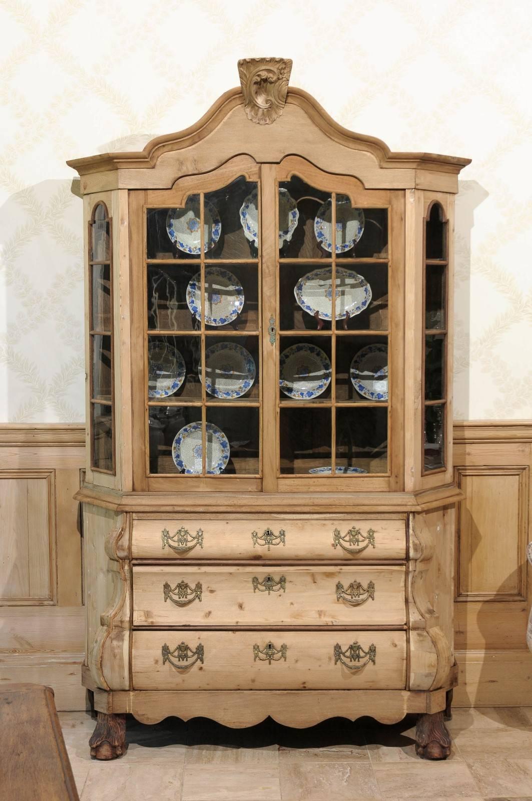 19th Century Glazed Pine Buffet Deux Corps, circa 1860
This is a stunning and eye-catching piece. The oversized feet and especially tall cornice give it a look that is classic Dutch. The glazed top is a bit unusual and provides an opportunity to