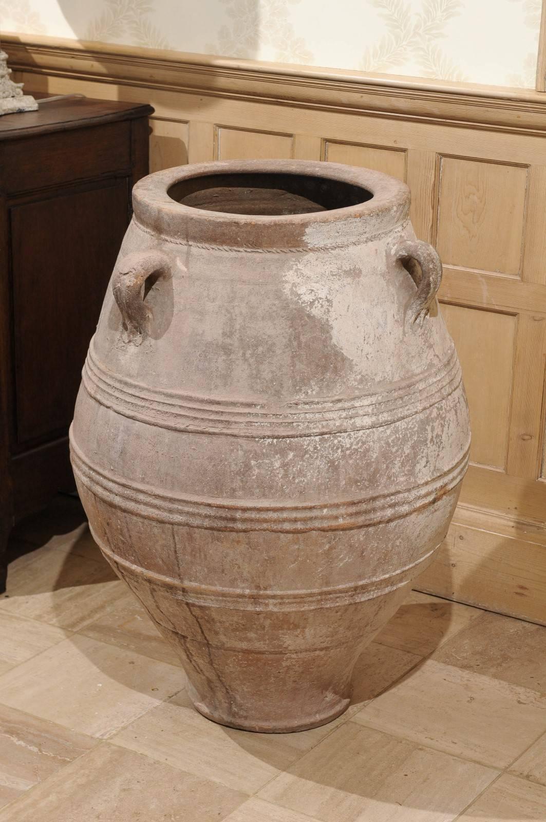 Mid-Century Large White Greek Terracotta Pot
If you have ever visited the Greek Isles, these pots adorn the patios and the squares of the quaint towns under a picture perfect blue sky. As you can see, this particular pot has very nice detailing and