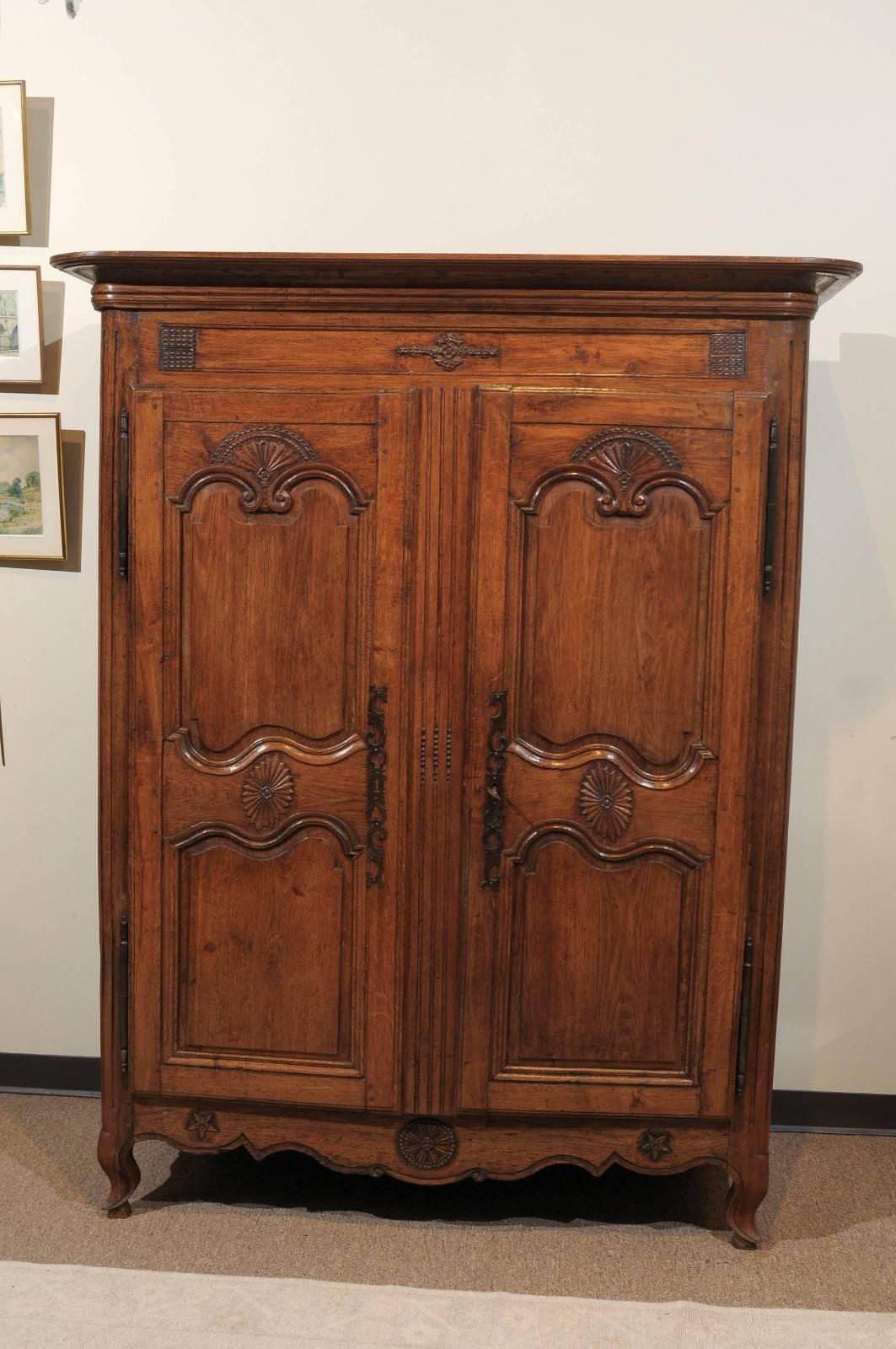 Small 19th Century Medium Brown Oak Armoire, circa 1860
This little armoire from Normandy has some really nice carving and a great patina. It is short enough to go in a room with eight or nine foot ceilings but large enough to provide a good deal of